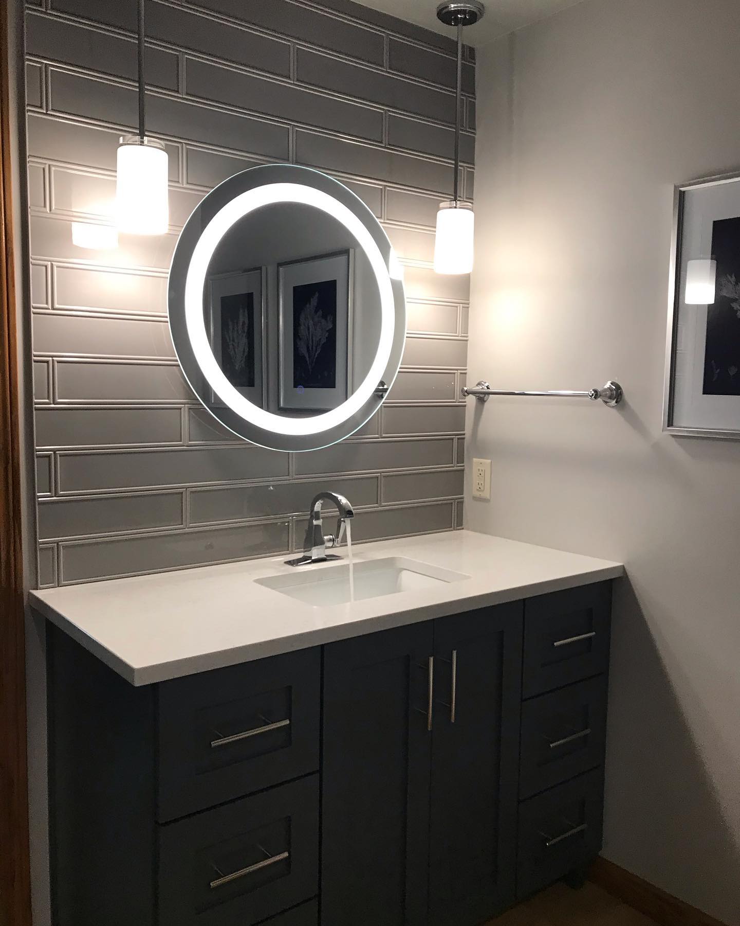 3. Reflective Serenity: the Chic Harmony Of Textured Gray Tiles and Modern Minimalism