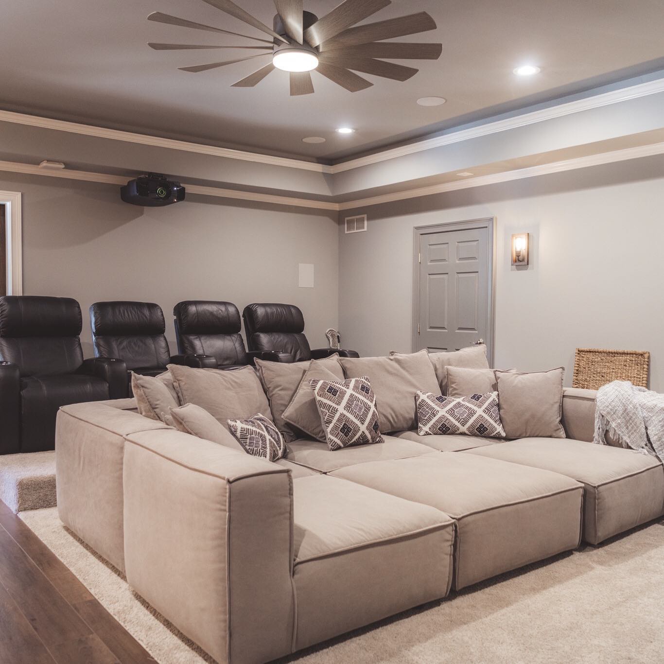 18. Cinematic Comfort Nest: Elevate Your Basement Retreat