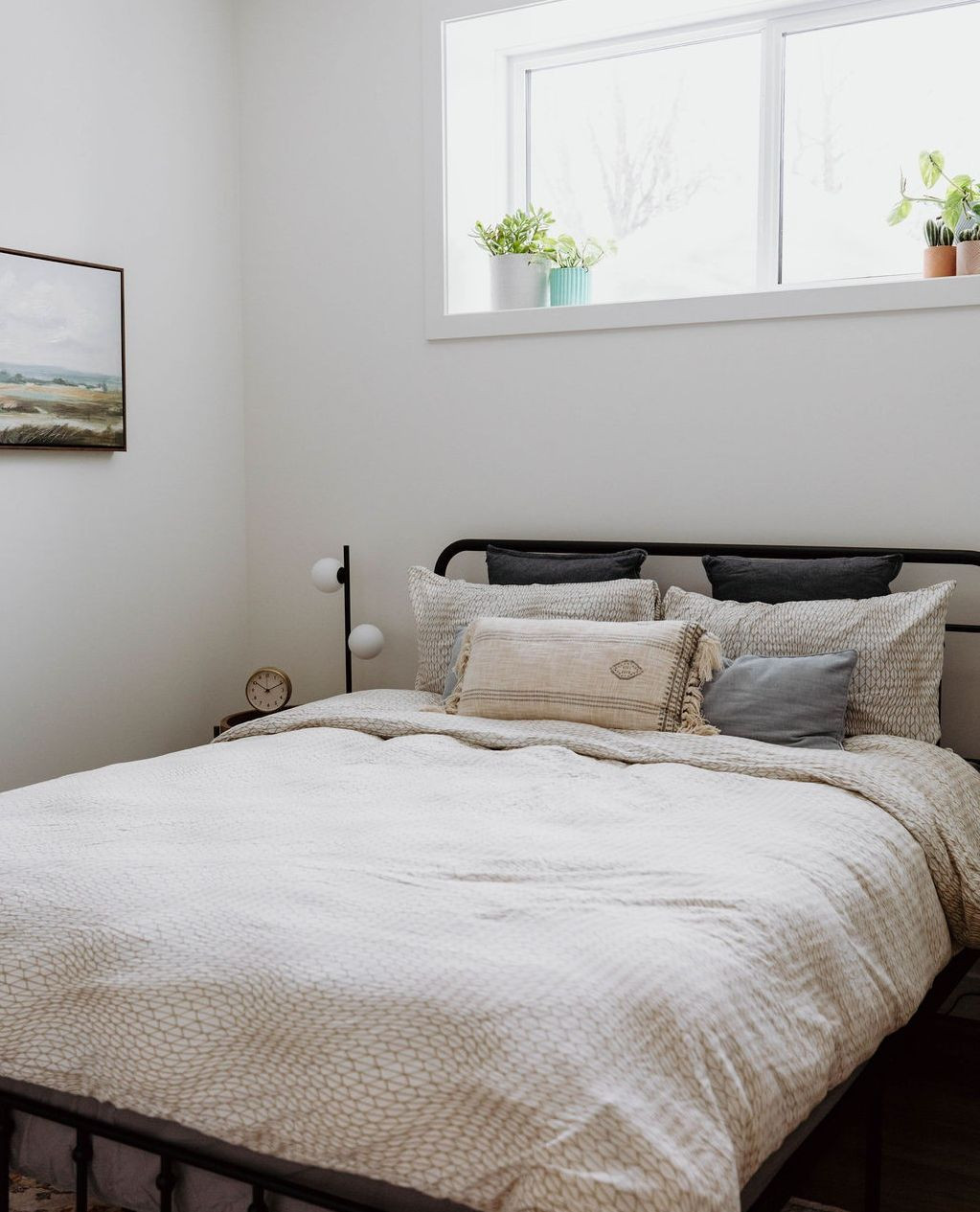 17. Serene Sanctuary: Embracing Minimalist Charm In a Basement Retreat