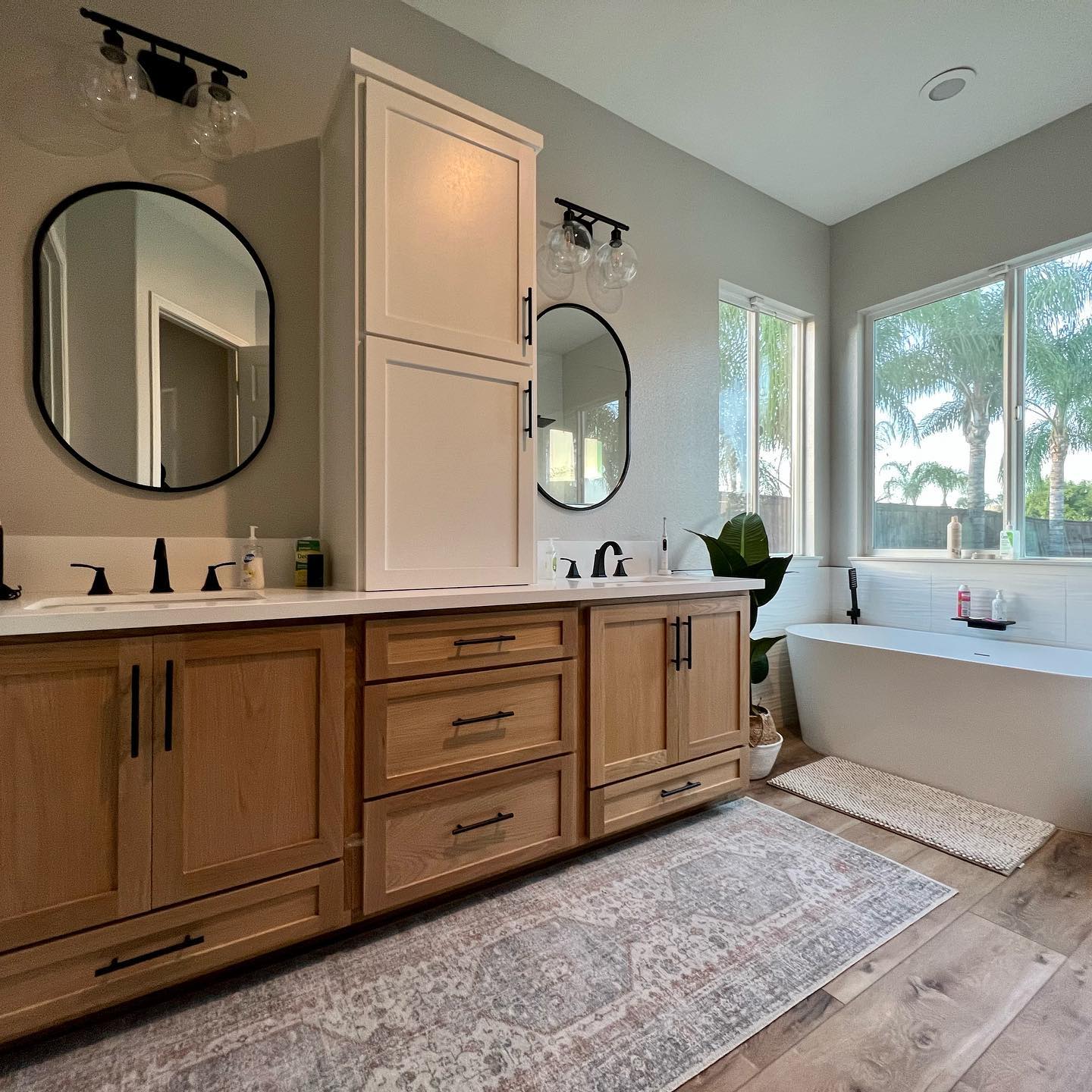 23. Sunlit Serenity: a Dual-mirror Oasis with Earthy Elegance