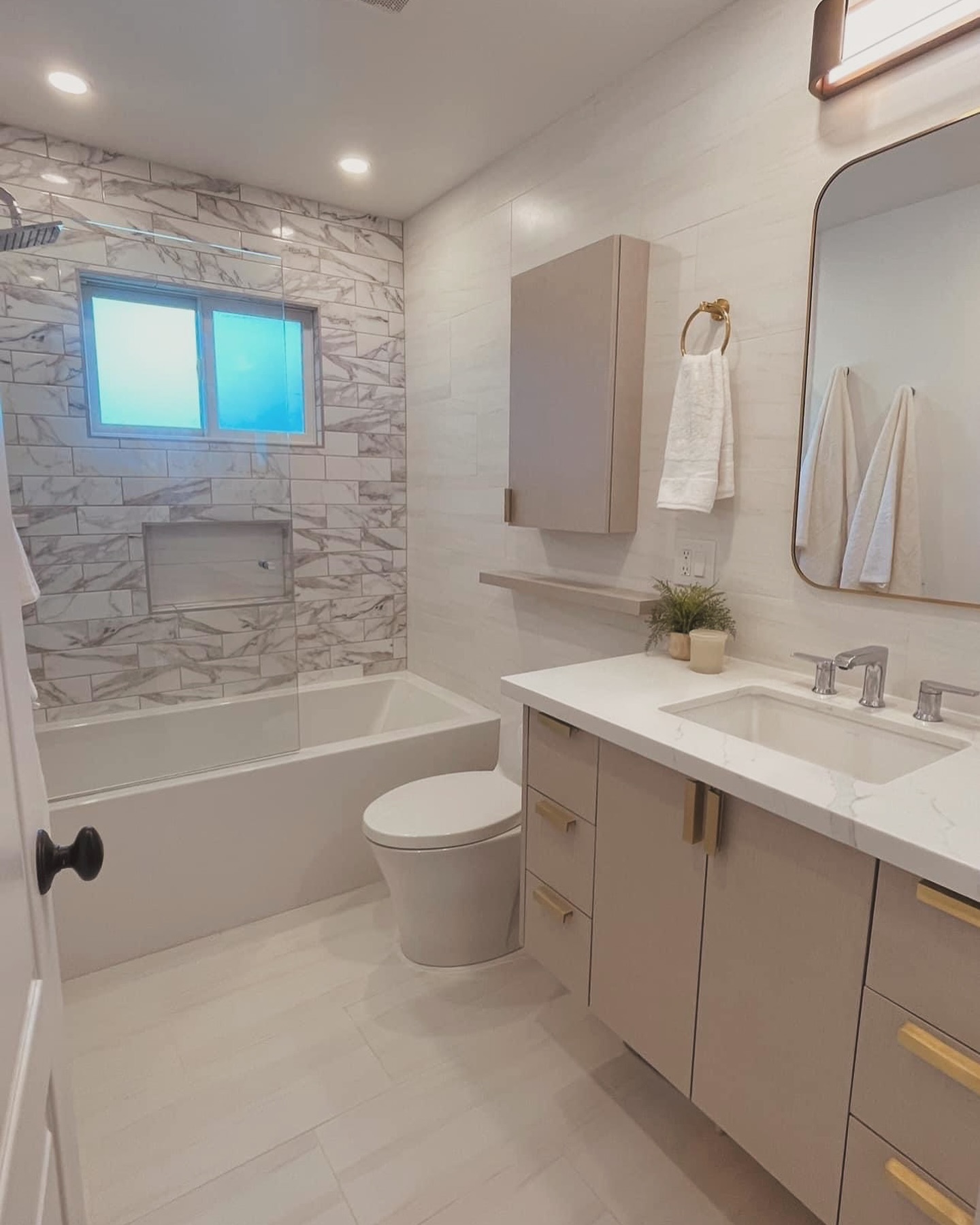 32. Timeless Tranquility: a Modern Bathroom Sanctuary with Subtle Luxury