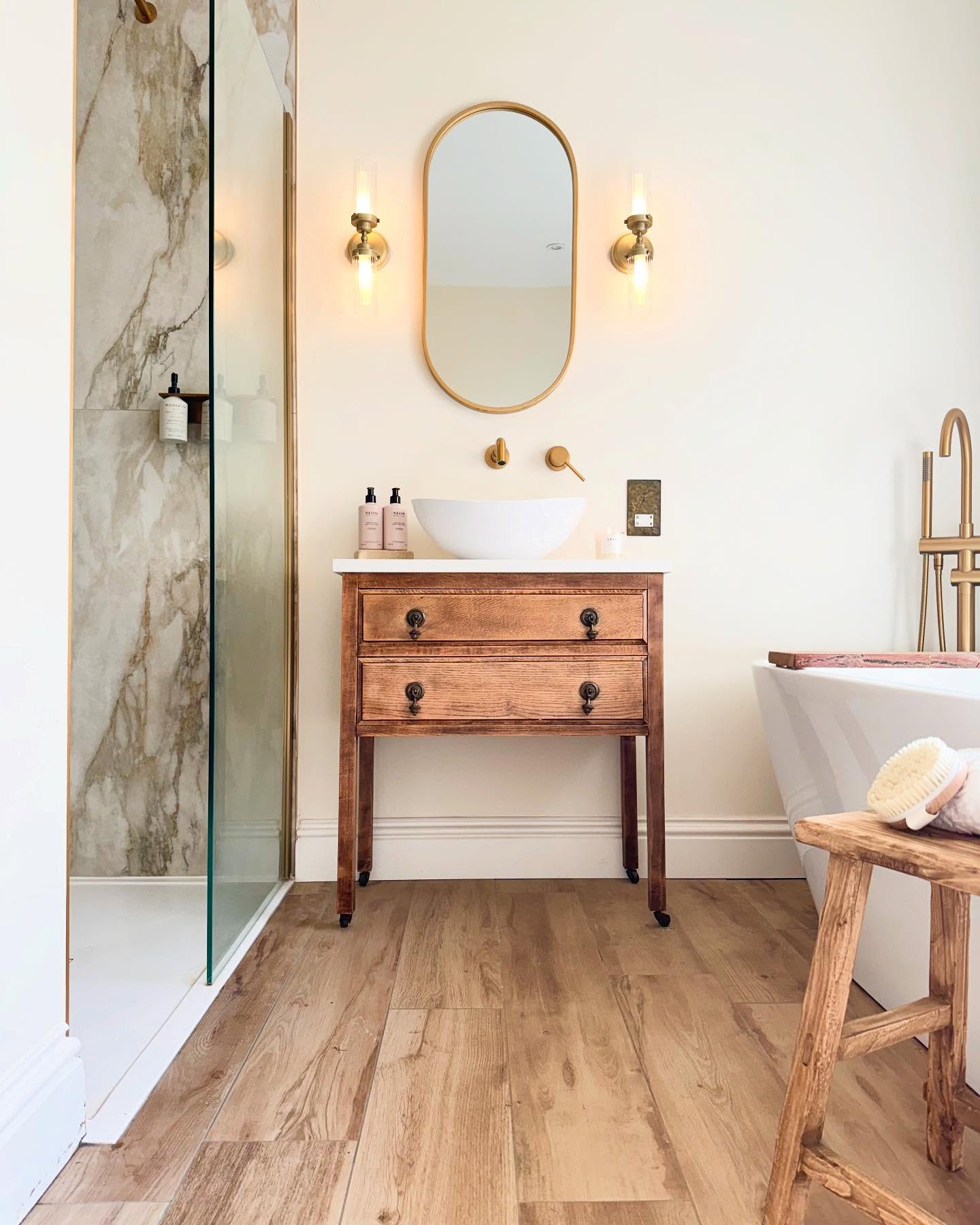 25. Vintage Charm Meets Modern Elegance: a Timeless Bathroom Retreat