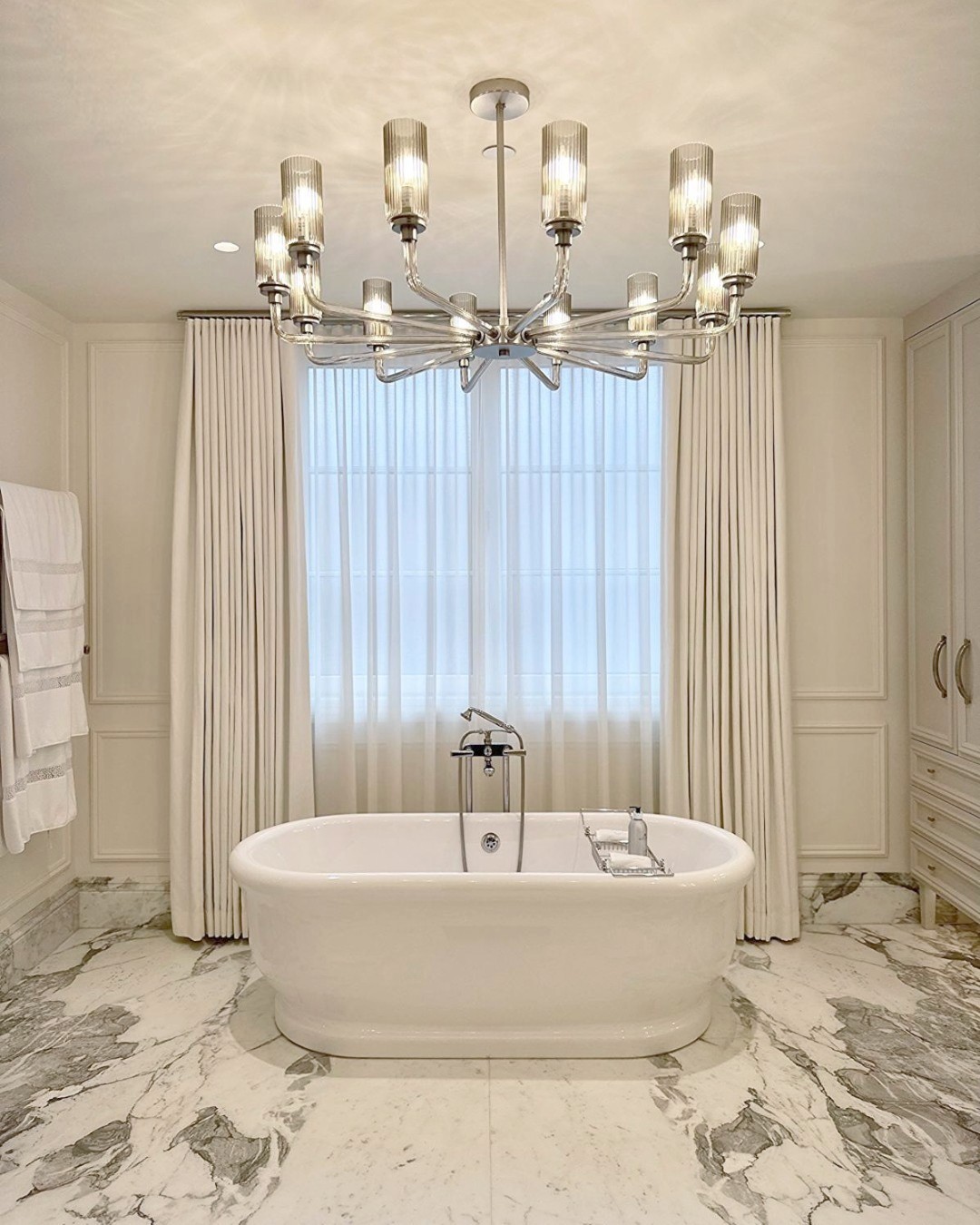 38. Elegance In Fluidity: Embracing Serene Simplicity In Marble Retreats