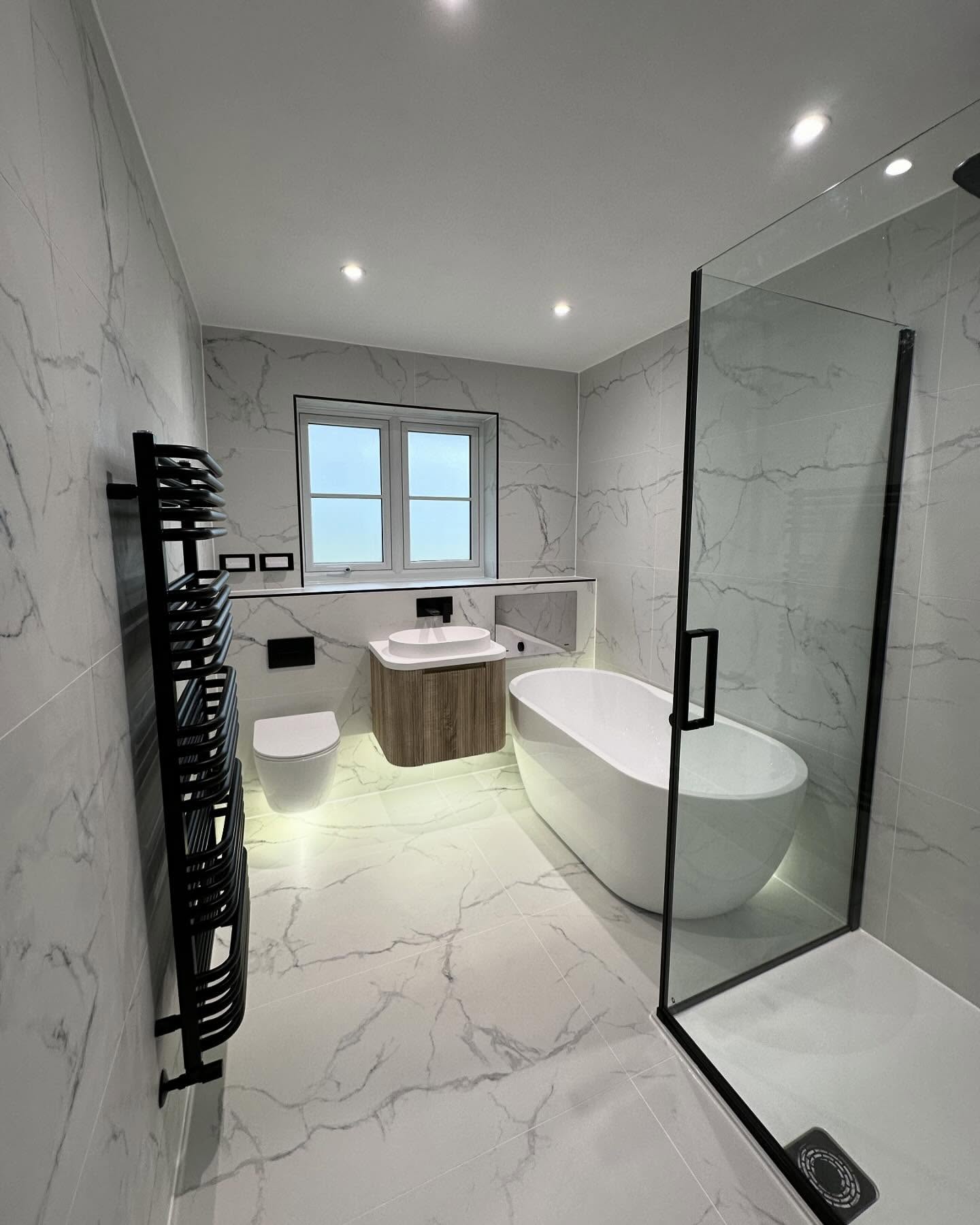 39. Sleek Serenity: Embracing Minimalism In Marble Bath Spaces