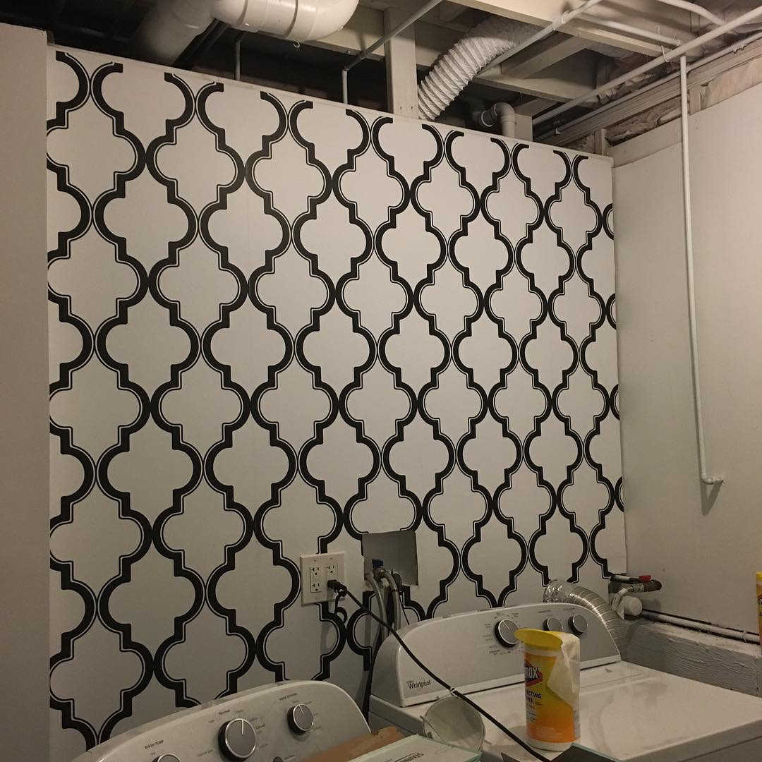 13. Boldly Geometric: Transforming Laundry Spaces with Striking Black-and-white Patterns