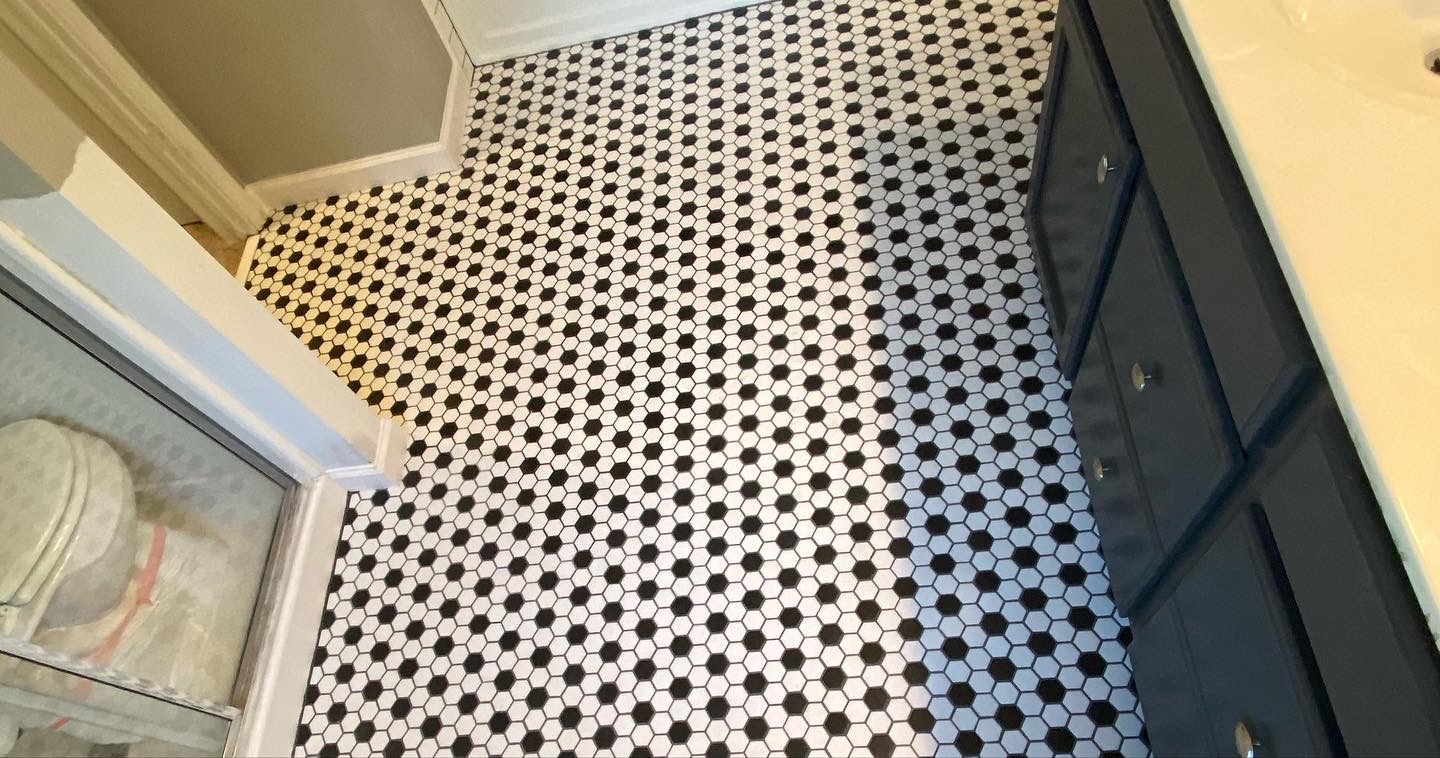 31. Hexagon Harmony: a Monochromatic Dance on Your Bathroom Floor