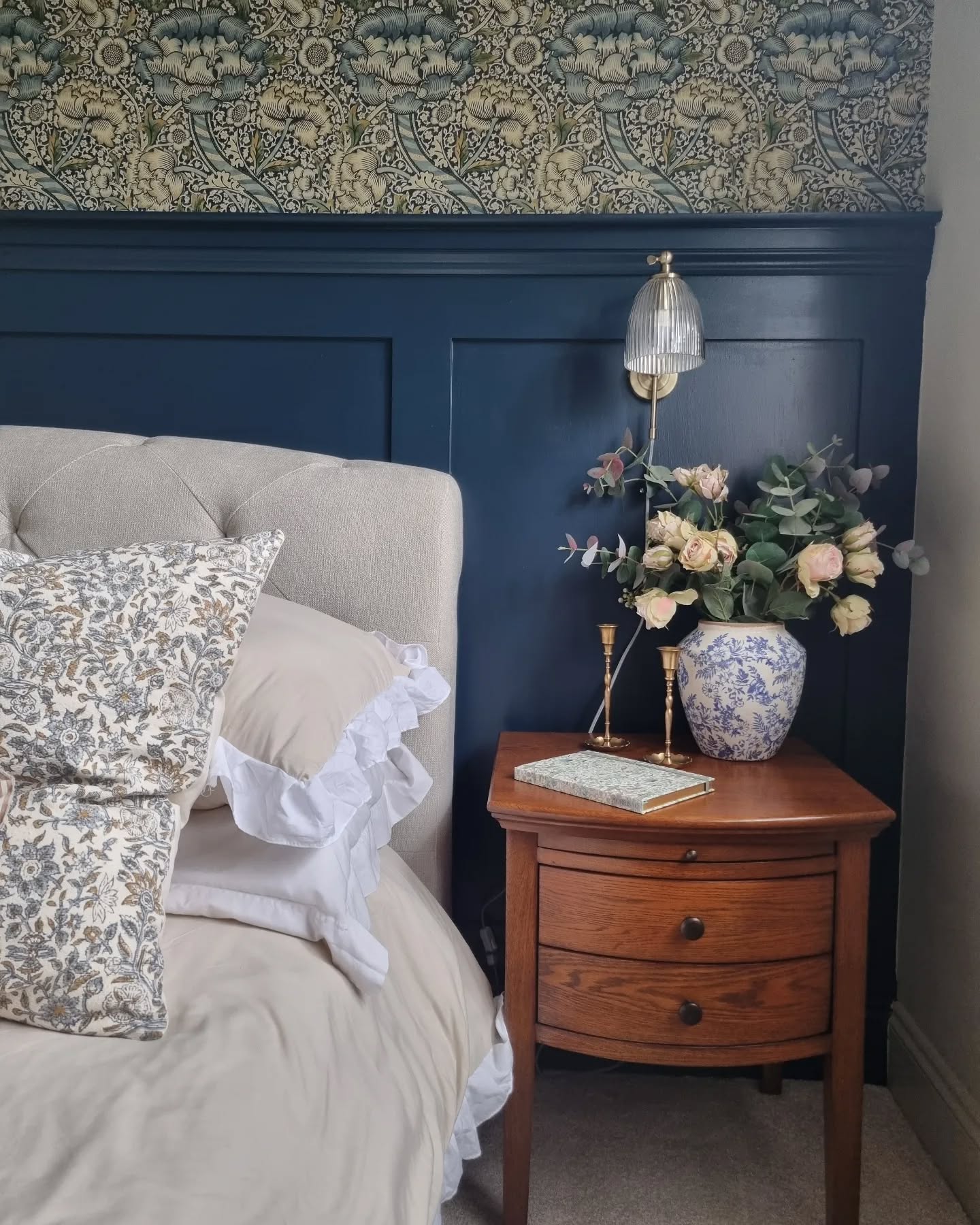 20. Vintage Bedroom with a Woven Rattan Bed and Mismatched Nightstands