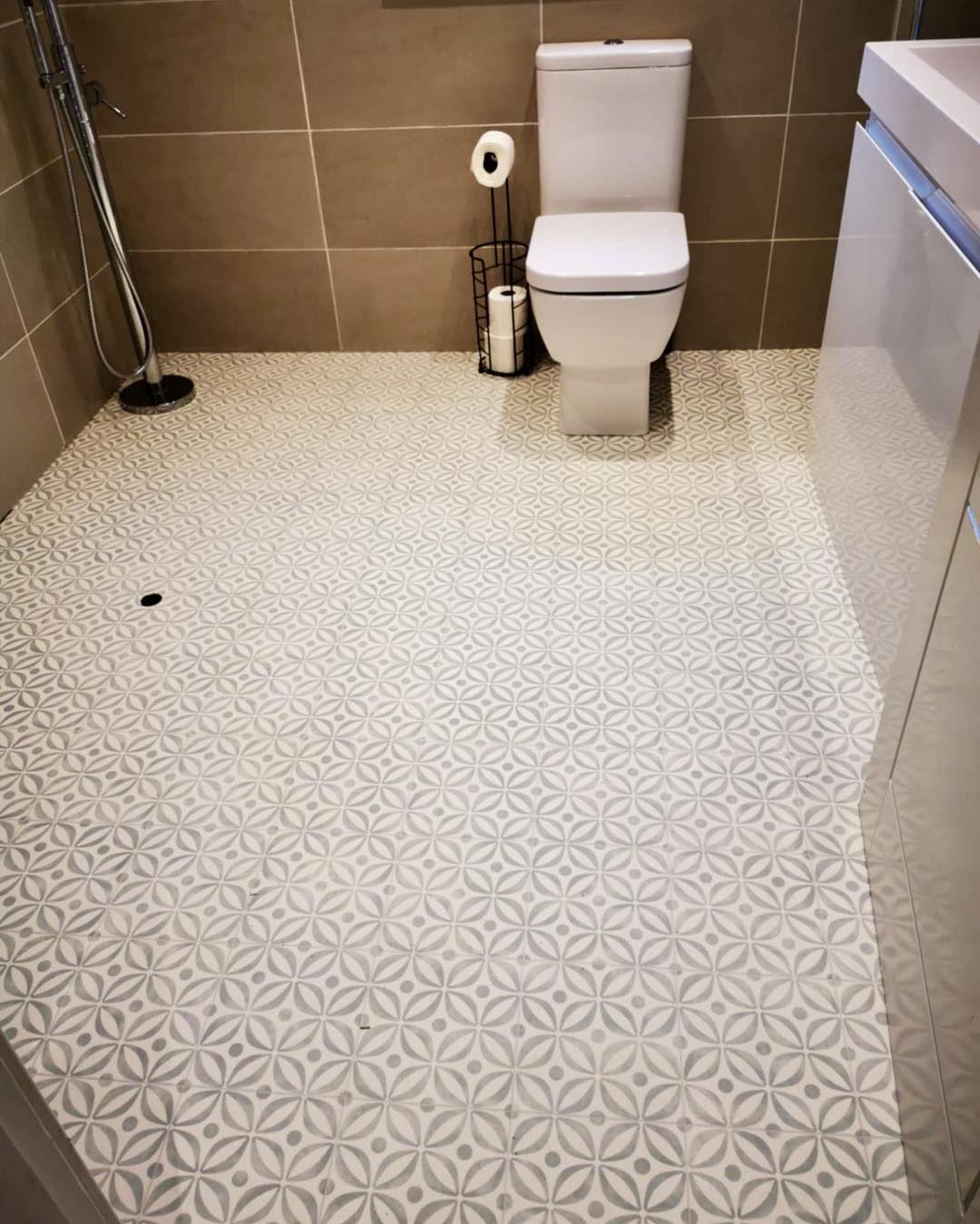 12. Meets Modern Chic: the Art Of Geometric Bathroom Flooring