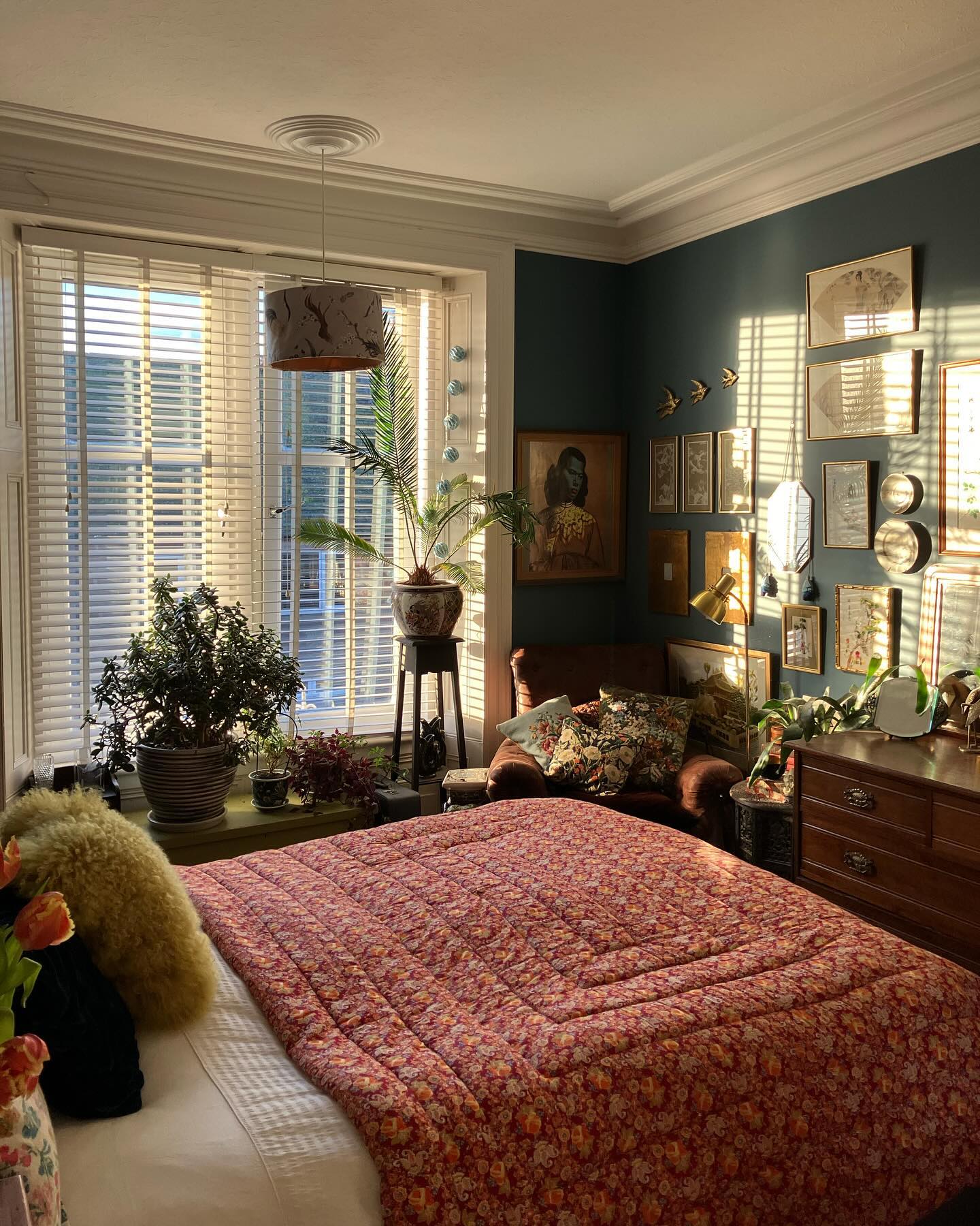 8. Moonlit Serenity: Vintage Bedroom with Wicker Canopy Bed and Delicate Lace Draping