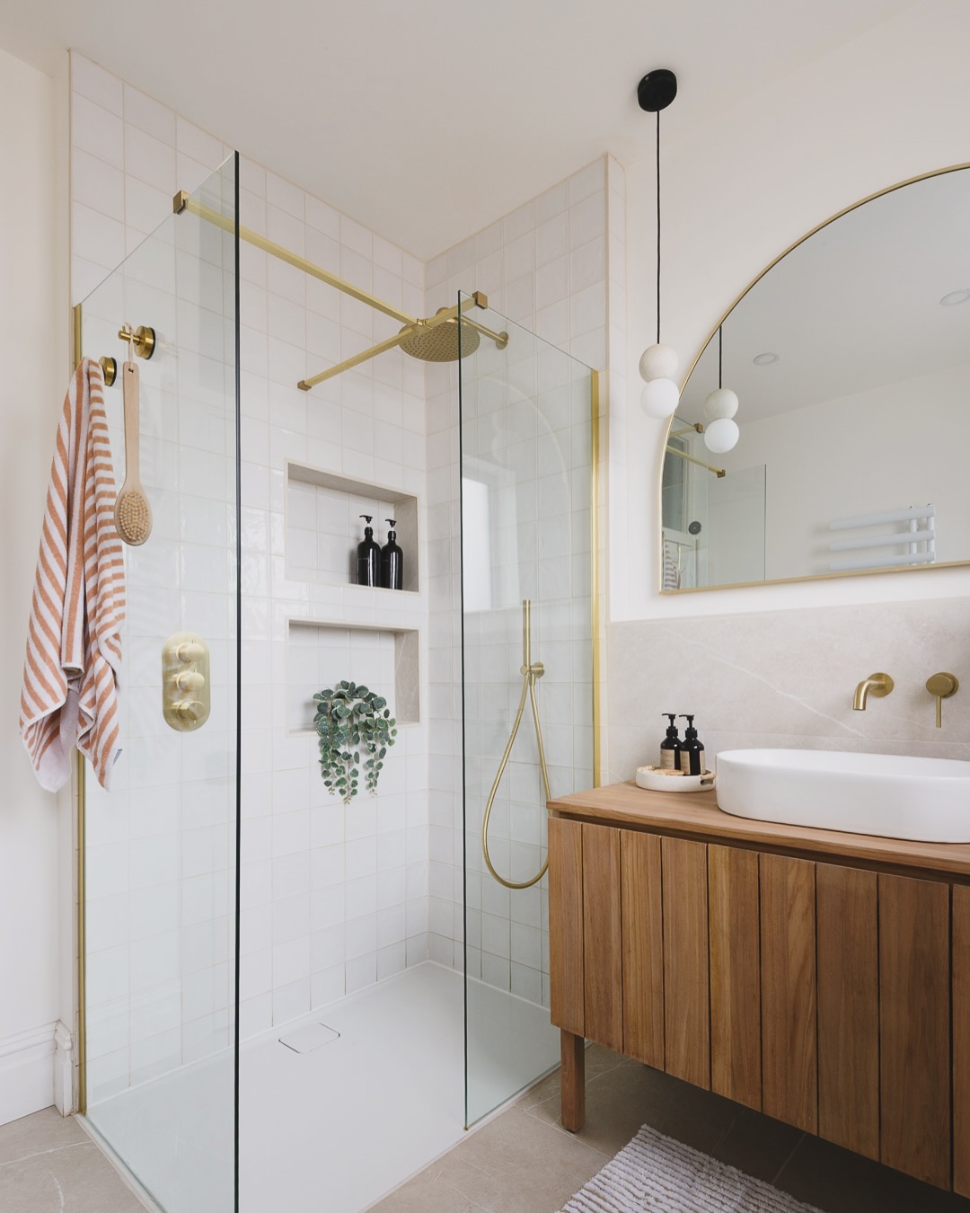 21. Serene Oasis: Where Minimalism Meets Gold Accents