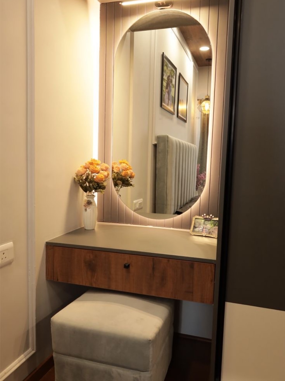 53. Moonlit Oval Mirror with Woven Rattan Frame Reflects Bedroom Serenity