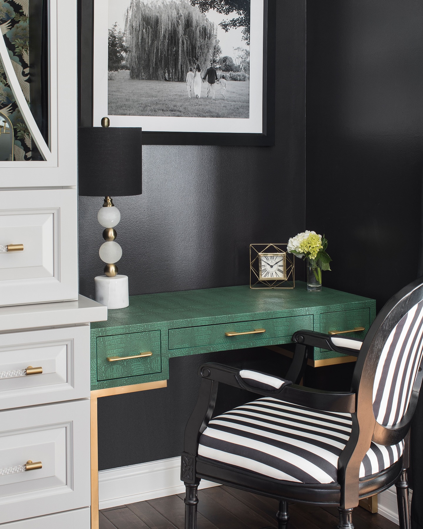 41. Elegant Contrast: a Bold Green Oasis Amidst Dark Interiors