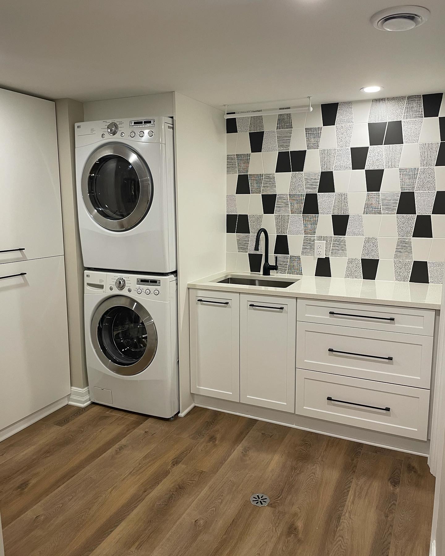 14. Monochrome Magic: a Stylish Take on Laundry Functionality