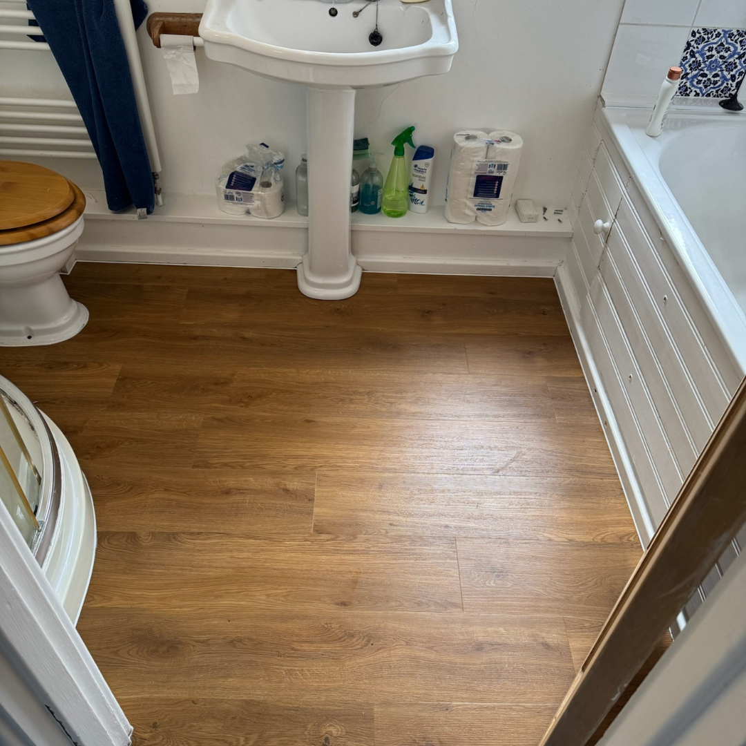 40. Warm Elegance: a Rustic Touch for Modern Bathrooms