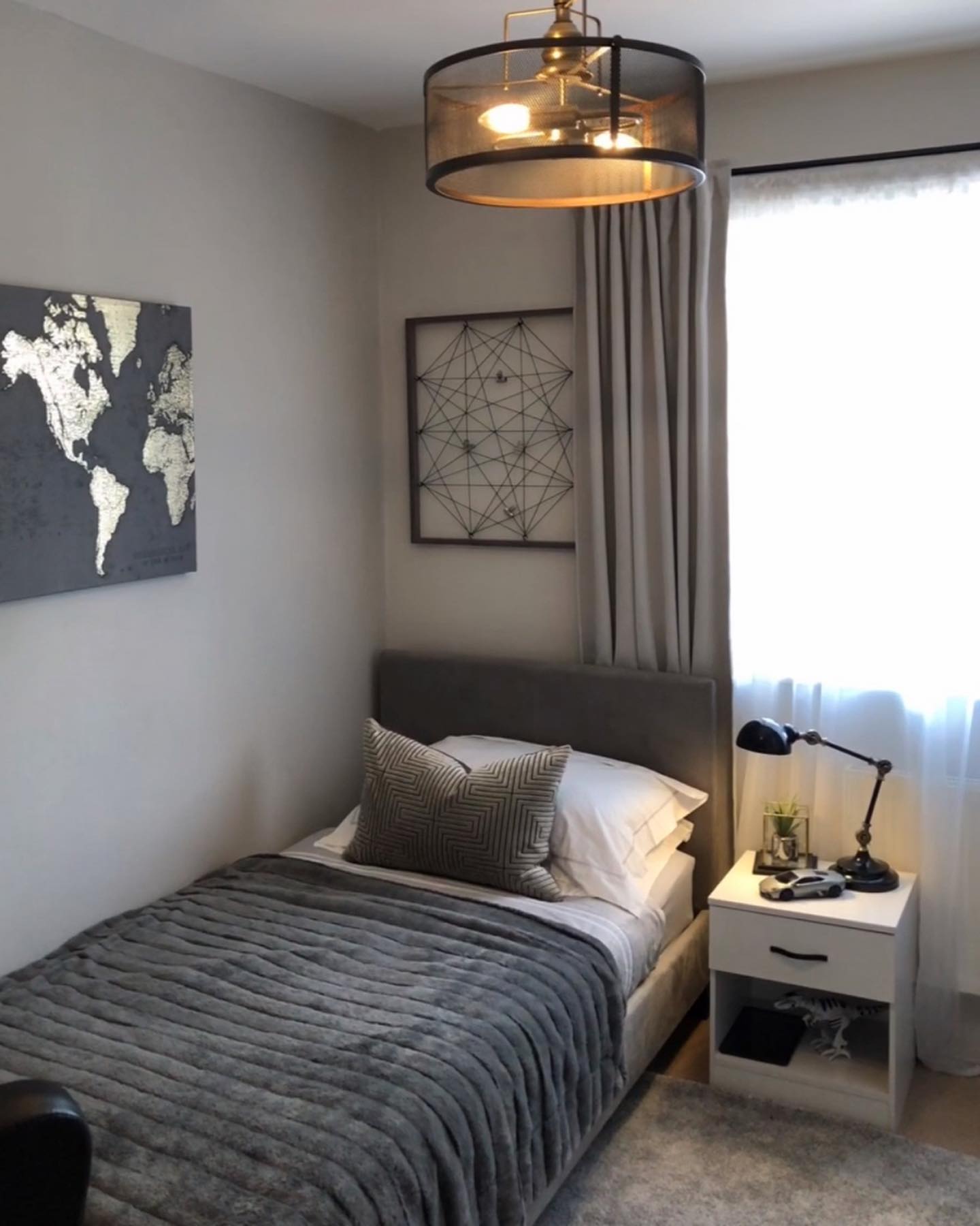 44. Moonlit Serenity: a Bedroom with a Floating Bed and Circular Wall Art