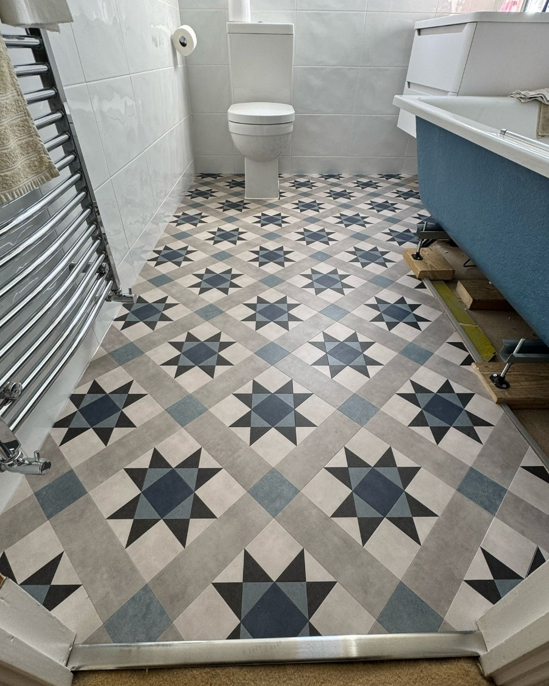 4. Starry Night Oasis: Embrace Geometric Charm In Your Bathroom