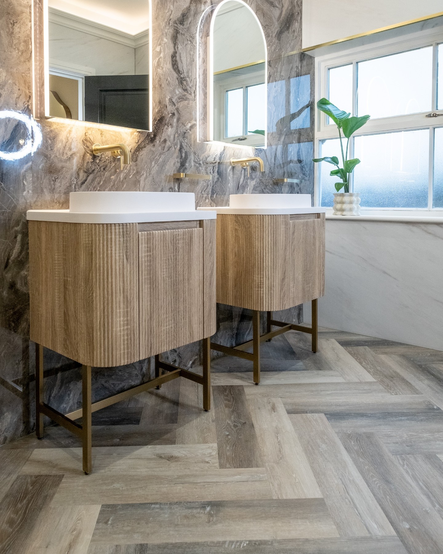 10. Elevated Serenity: Harmonizing Luxe Finishes with Rustic-toned Herringbone