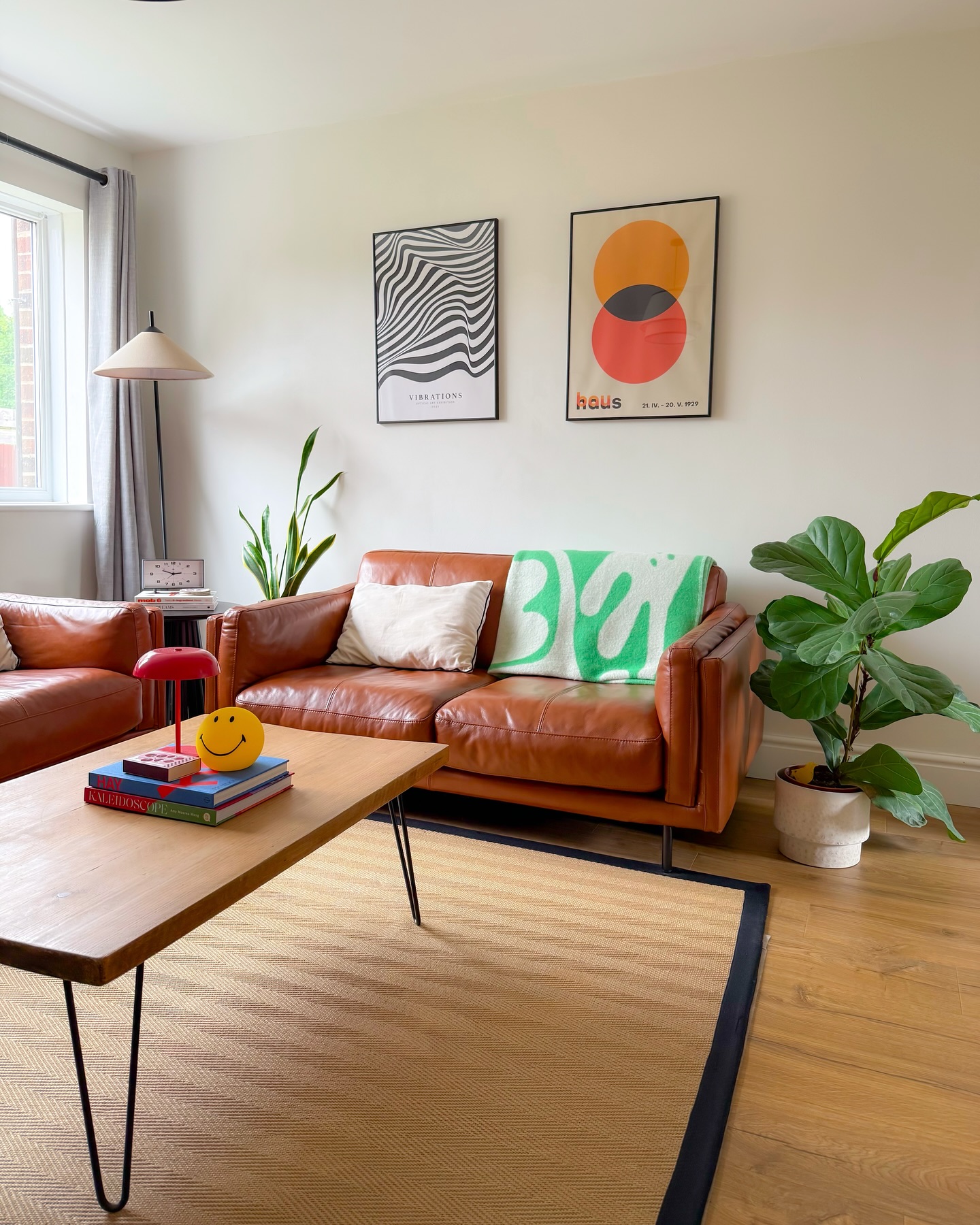 44. Chic Retro Vibes Mingle with Modern Minimalism In a Small Living Space