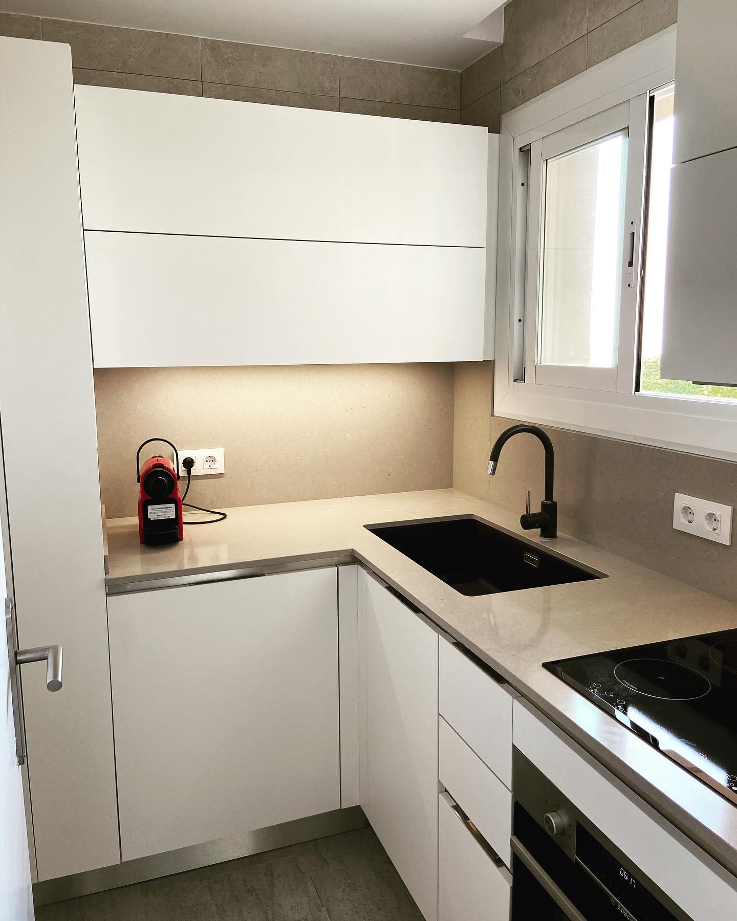 25. Minimalist Serenity: the Elegance Of Layered Neutrals In Compact Cooking Spaces