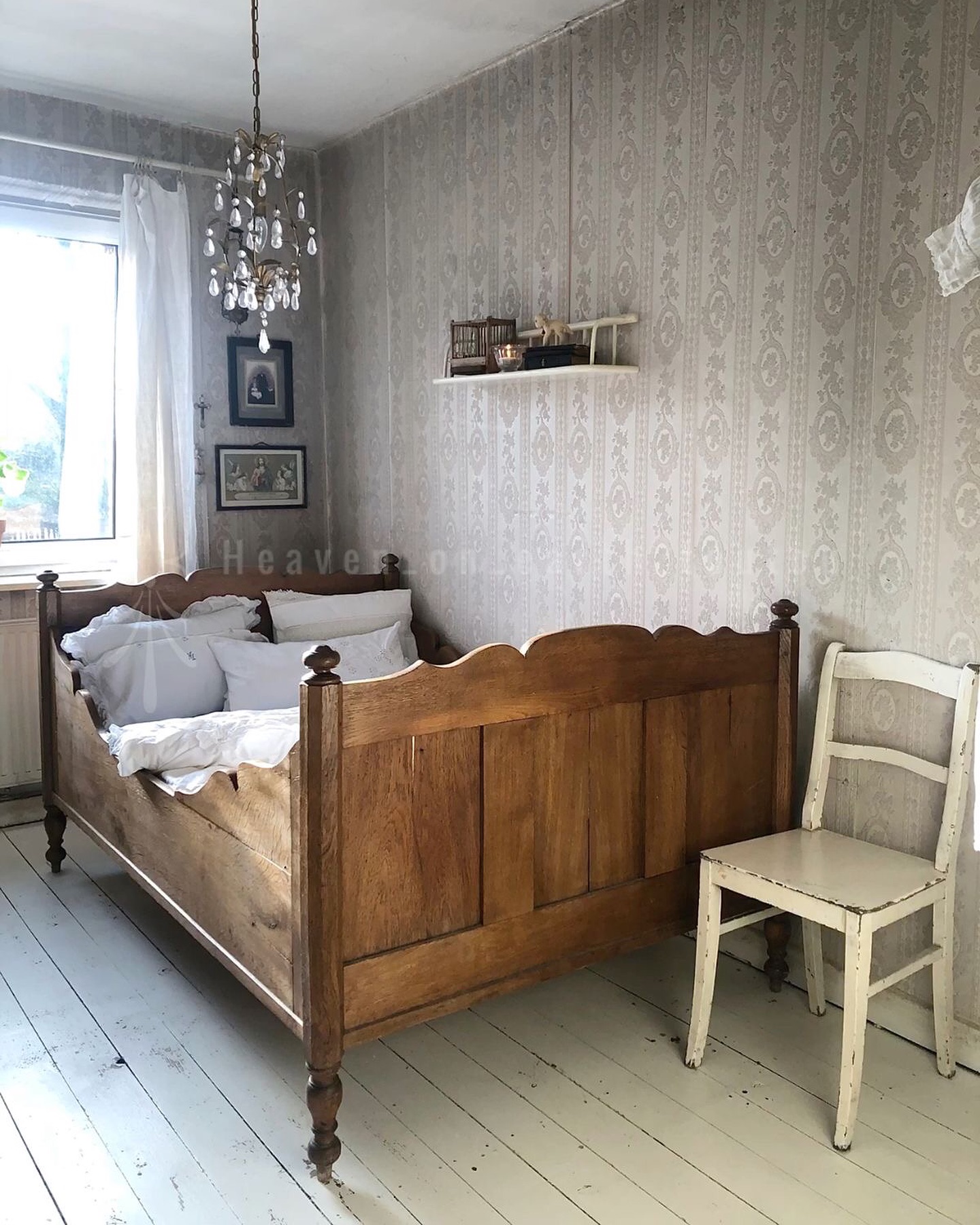 3. Vintage Bedroom with a Whimsical Canopy and Botanical Wall Art