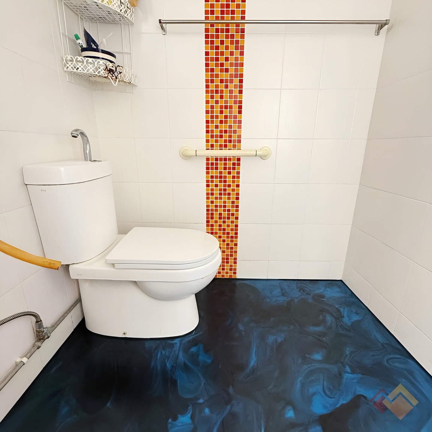 2. Oceanic Whirl: Transforming Your Bathroom with Ethereal Swirls and Vibrant Accents