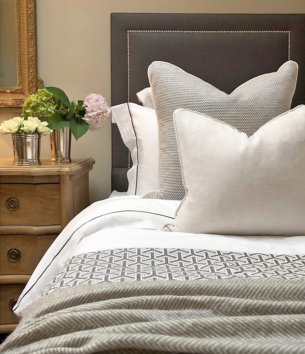 13. Twilight Glow Bed Nook with Starry Canopy and Geometric Wall Accents