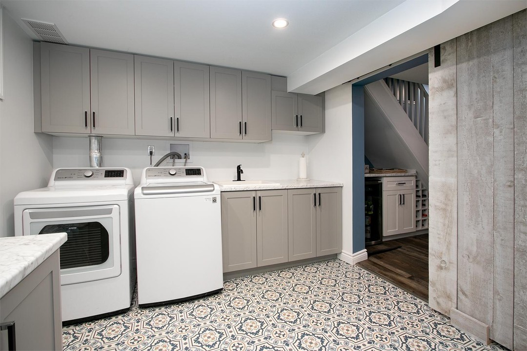 1. a Stylish Sanctuary: Elevating Your Basement Laundry with Patterned Elegance