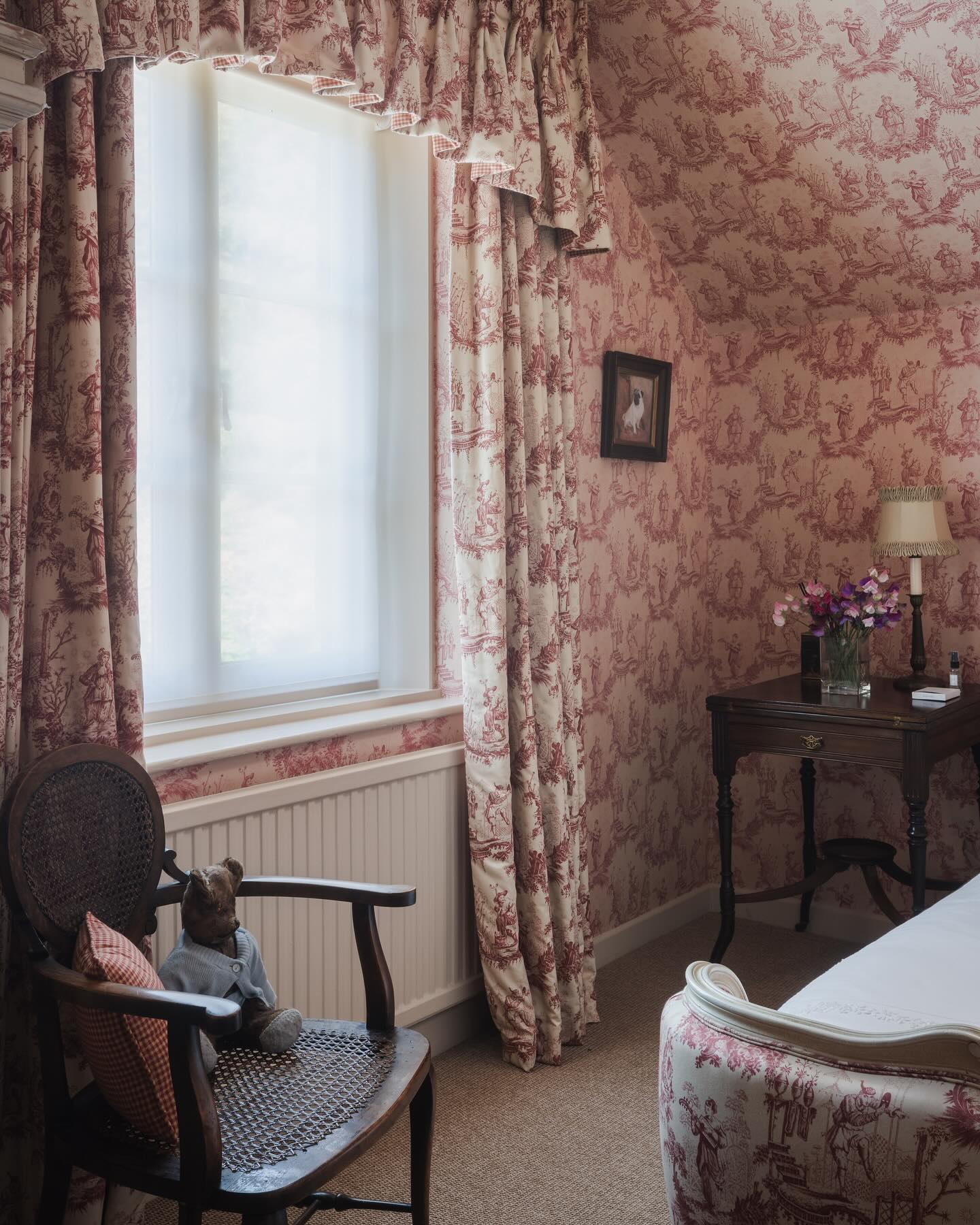 31. Moonlit Serenity: a Bedside Haven with Soft Blue Accents and Glowing Orb Lights