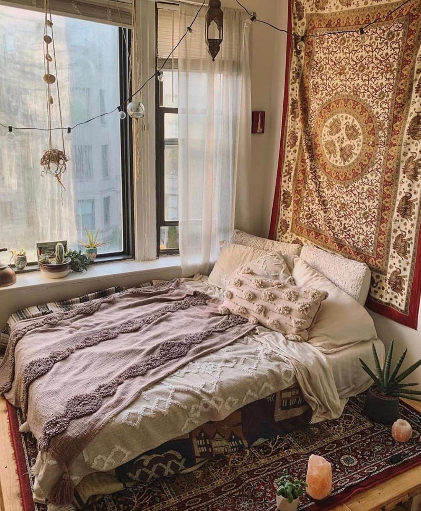 7. Bohemian Tapestry Wall with Macrame Dreamcatcher Over Vintage Bed