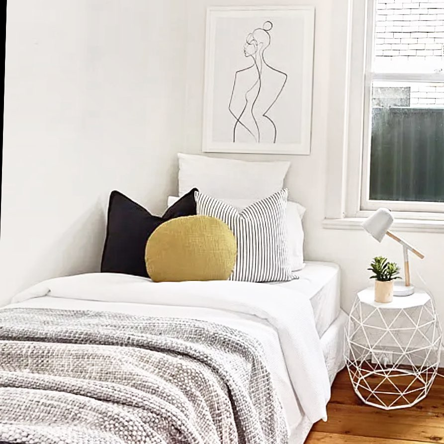 26. Soft Lavender Glow with Geometric Accents Bedroom