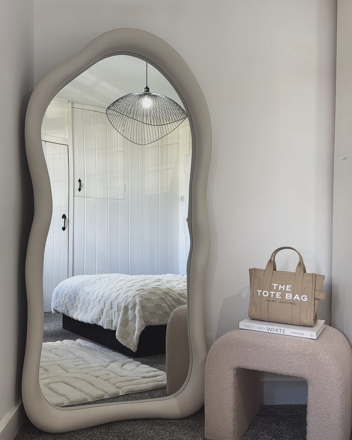 33. Moonlit Serenity: a Crescent-shaped Mirror Reflecting Tranquil Ambiance