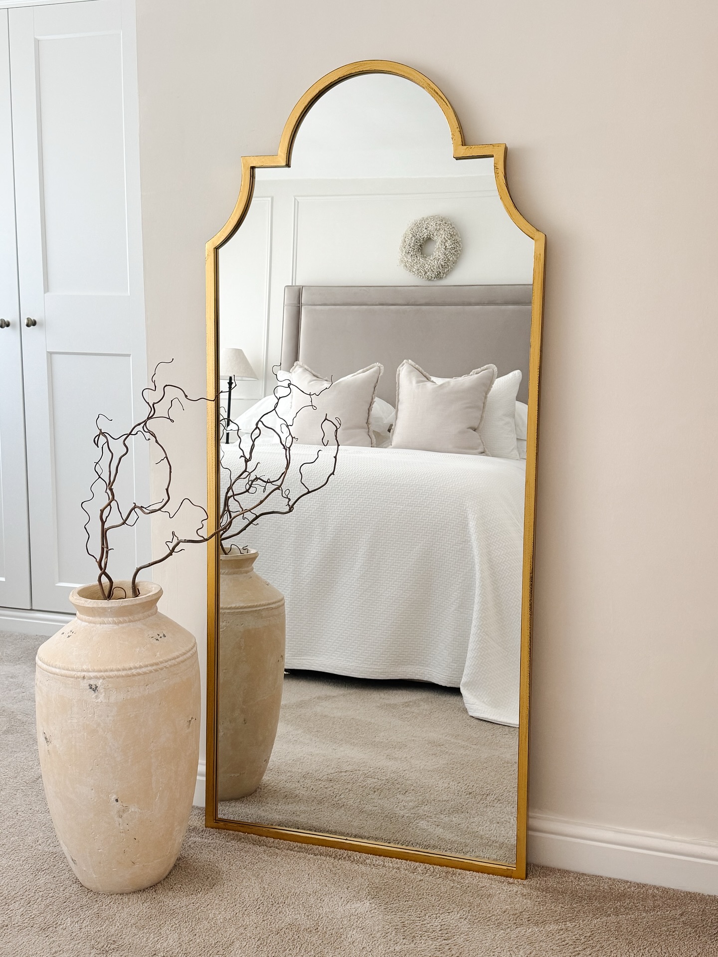 12. the Moonlit Arch: a Bedroom Mirror with Crescent Cutouts and Silver Accents