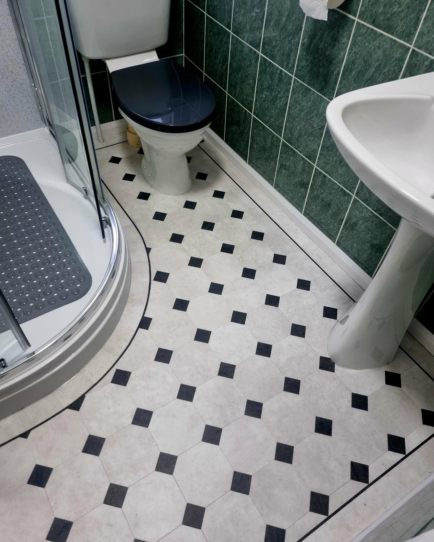 7. Chic Hexagonal Harmony: a Timeless Bathroom Flooring Delight