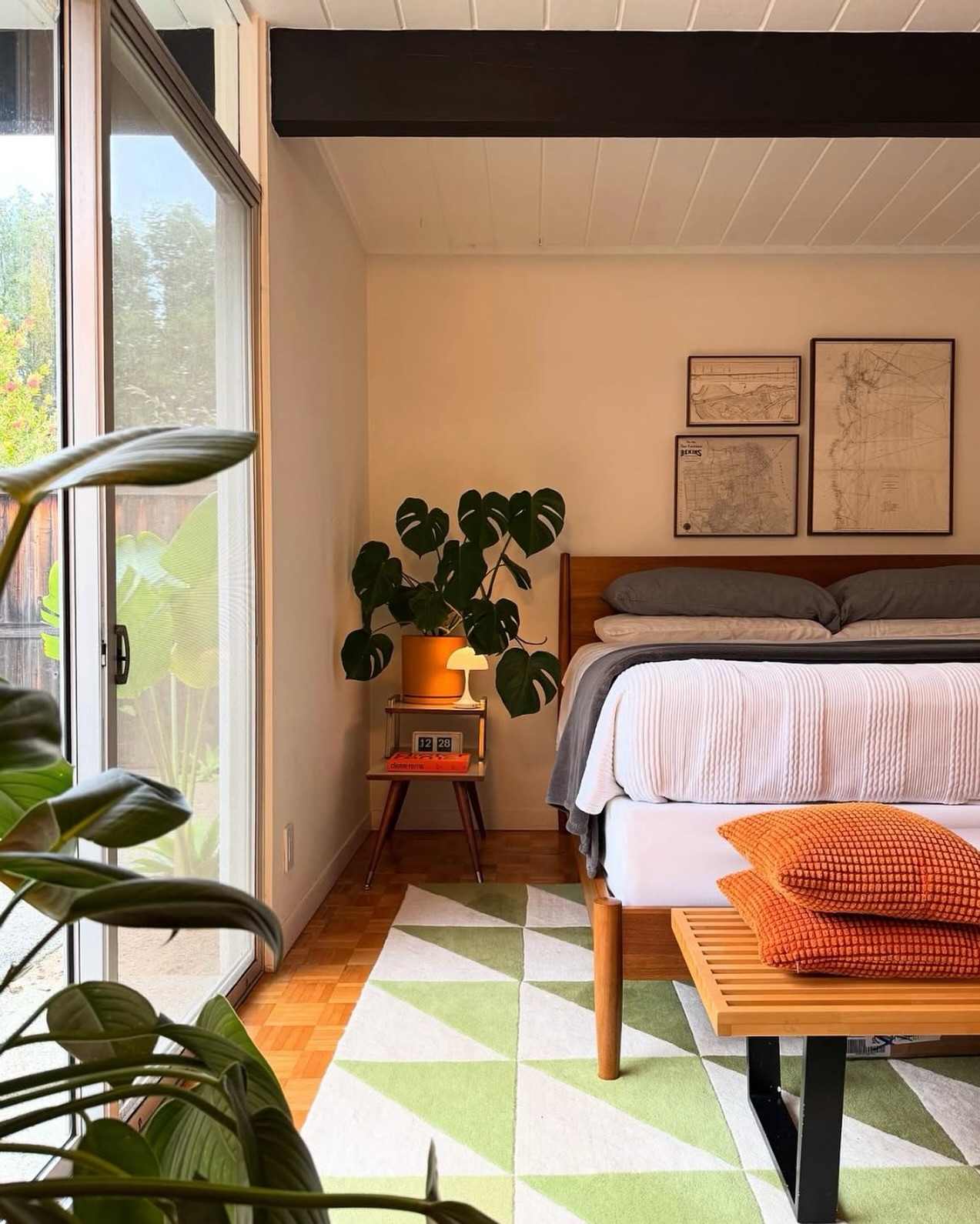 30. Vintage Charm with a Twist: the Gold-accented Bedside Clock and Monogrammed Pillow Ensemble