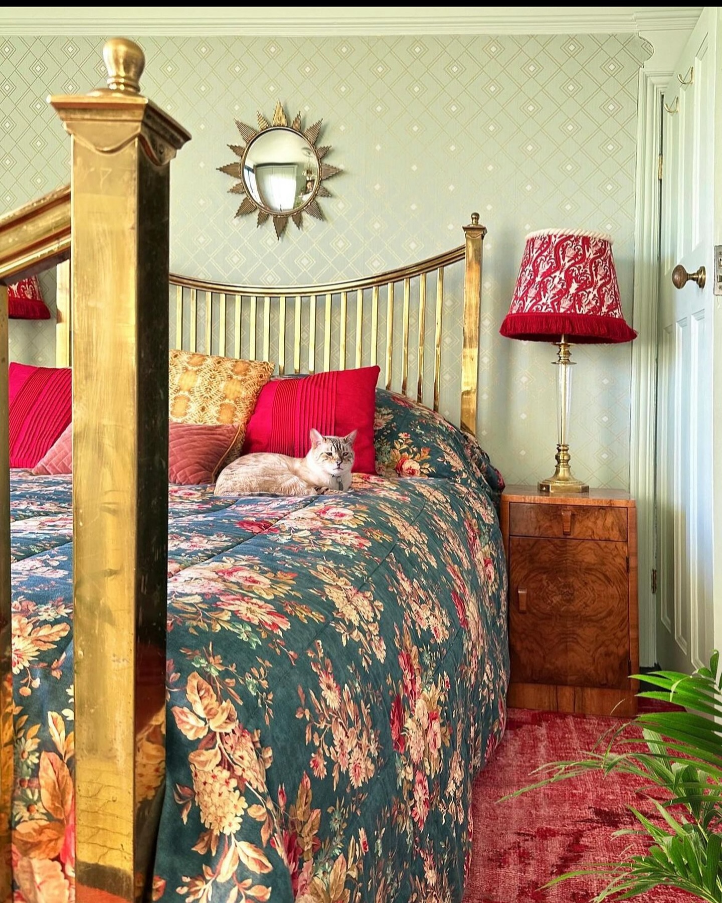 43. Vintage Bedside Charm: Velvet Cushions and Brass Accents In a Dusty Rose Setting