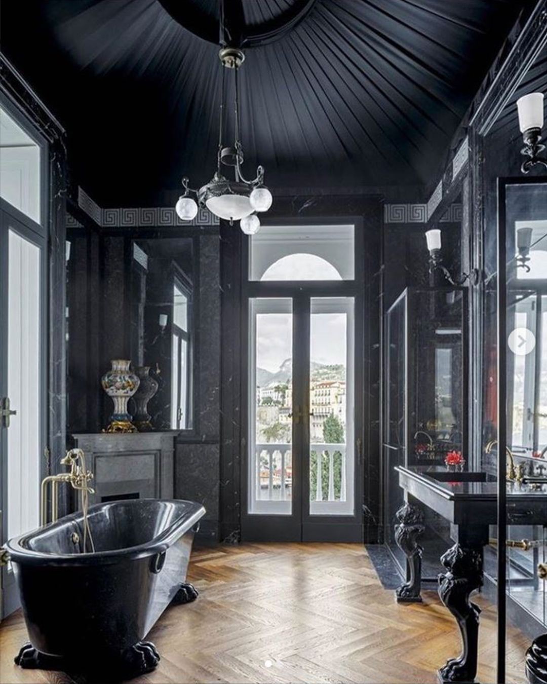 29. Gothic Elegance Meets Modern Luxury: a Black Oasis Of Serenity
