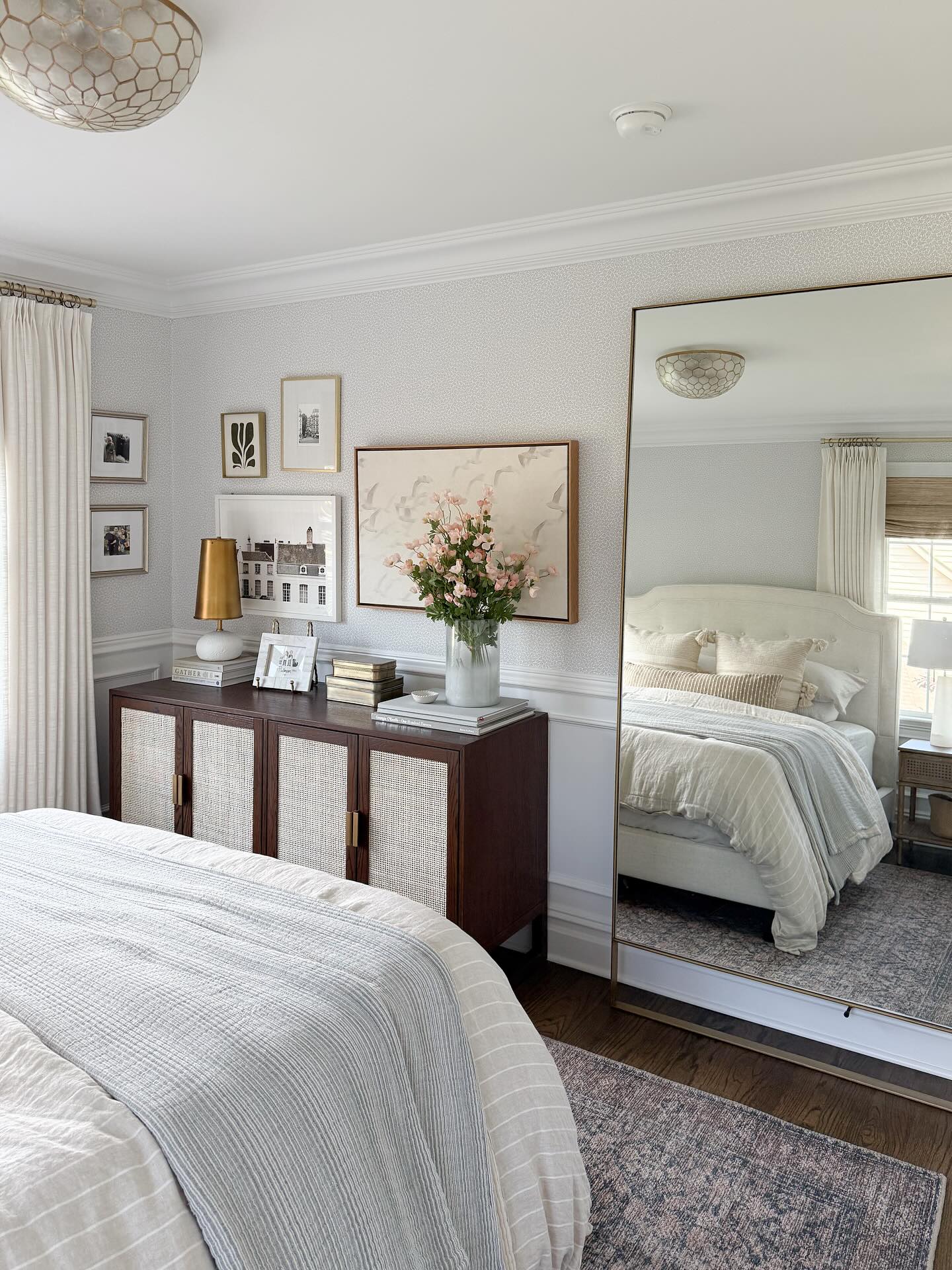 10. a Tapestry Of Reflections with a Gilded Frame Accent
