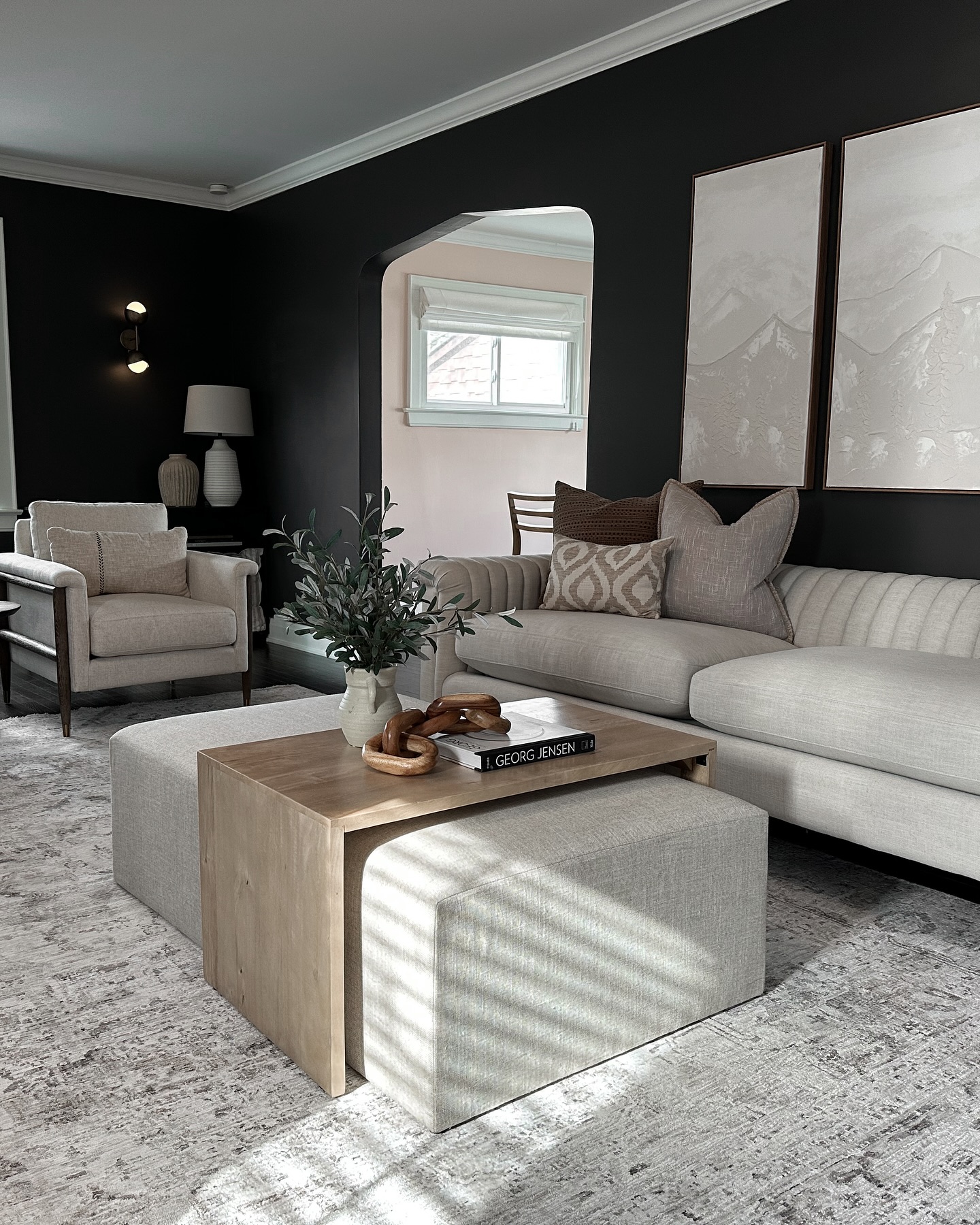 13. Boucle and Black: a Cozy Contrast Of Textures and Shadows