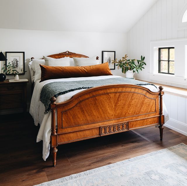11. Vintage Bedroom with a Crimson Velvet Canopy Bed and Gold Accents