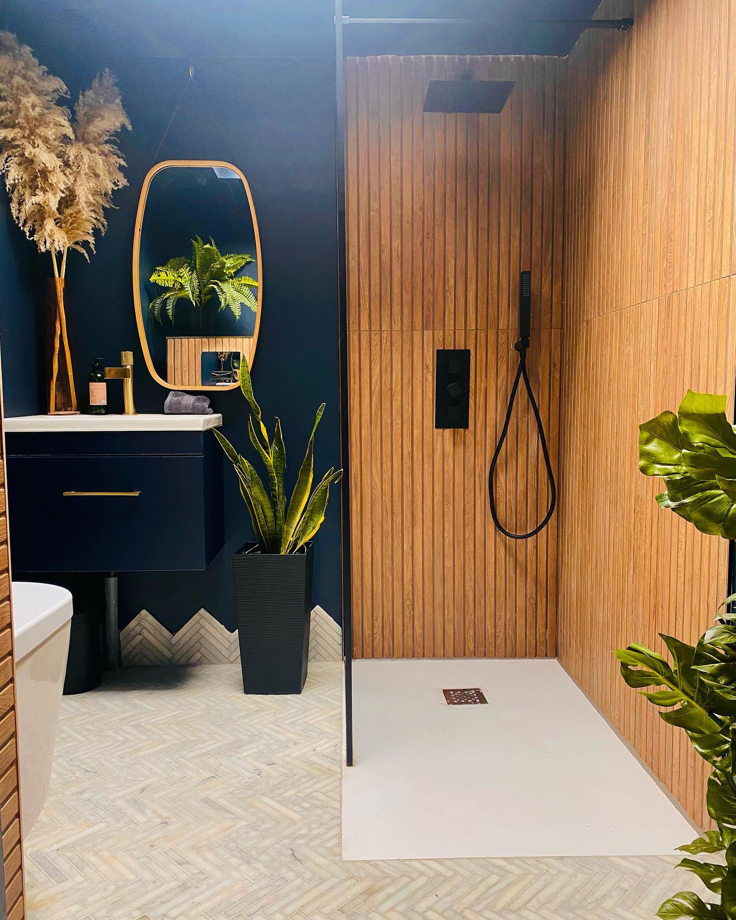 22. Nature Meets Elegance: the Dark Escape Bathroom