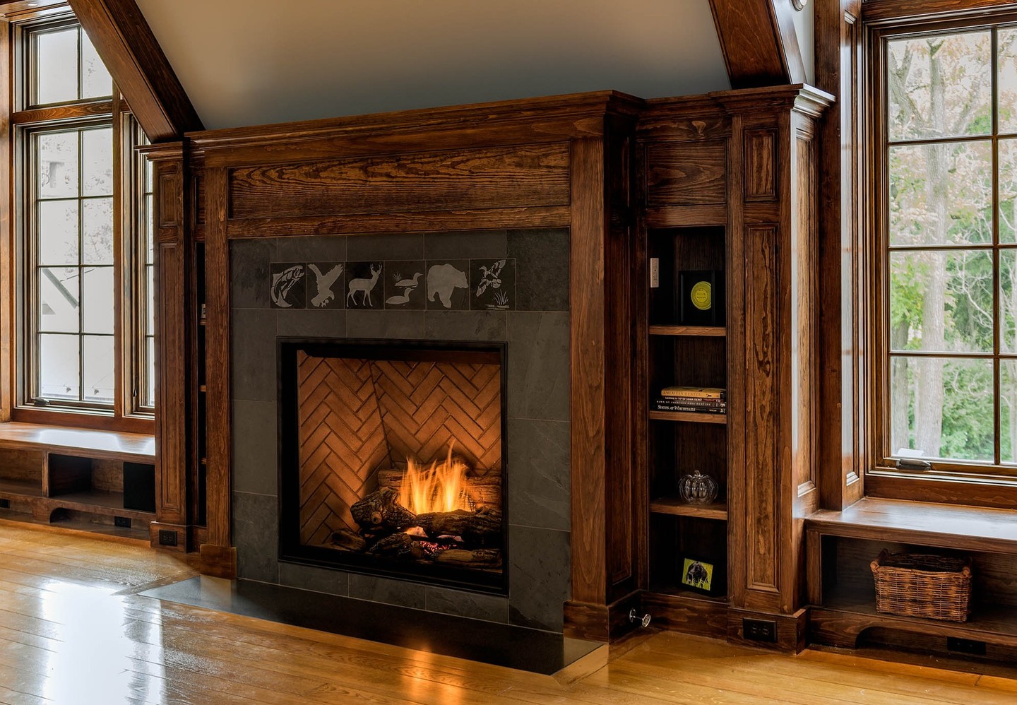 23. Nature's Embrace: a Fireplace Surrounded by Artful Wildlife