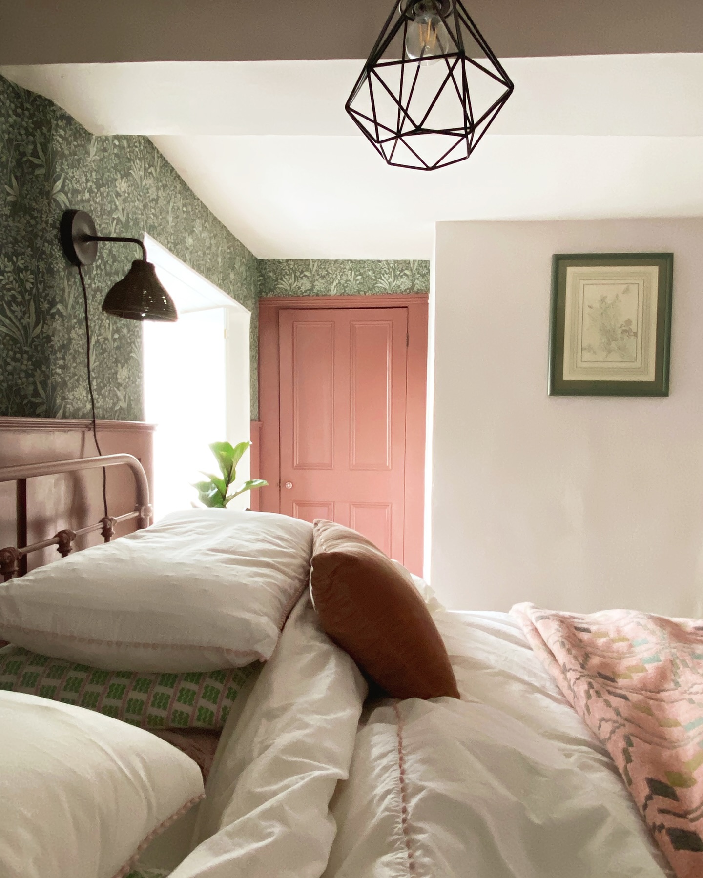 58. Vintage Bedroom with Hand-painted Floral Wall and Brass Bed Frame
