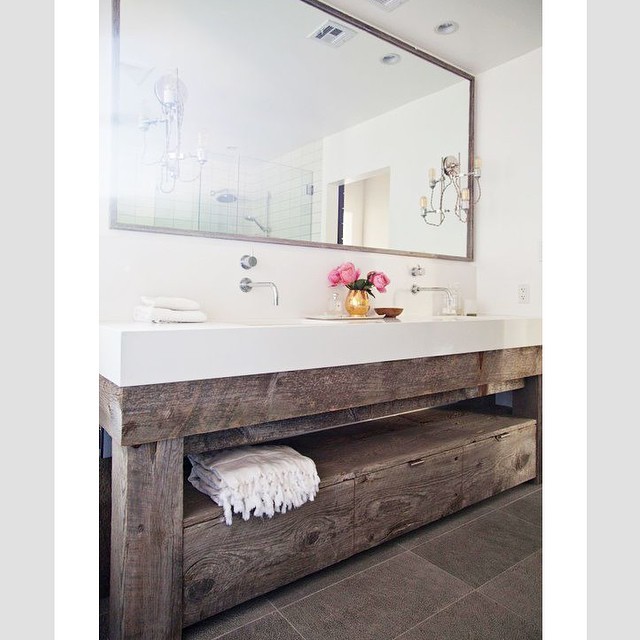 16. Rustic Elegance Meets Modern Minimalism: a Dual-purpose Bathroom Oasis