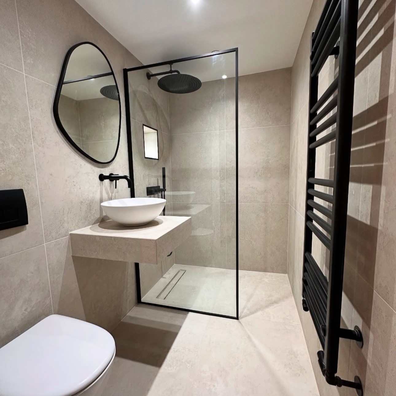 24. Sanctuary Of Shadows: Embracing Minimalism with Striking Black Accents