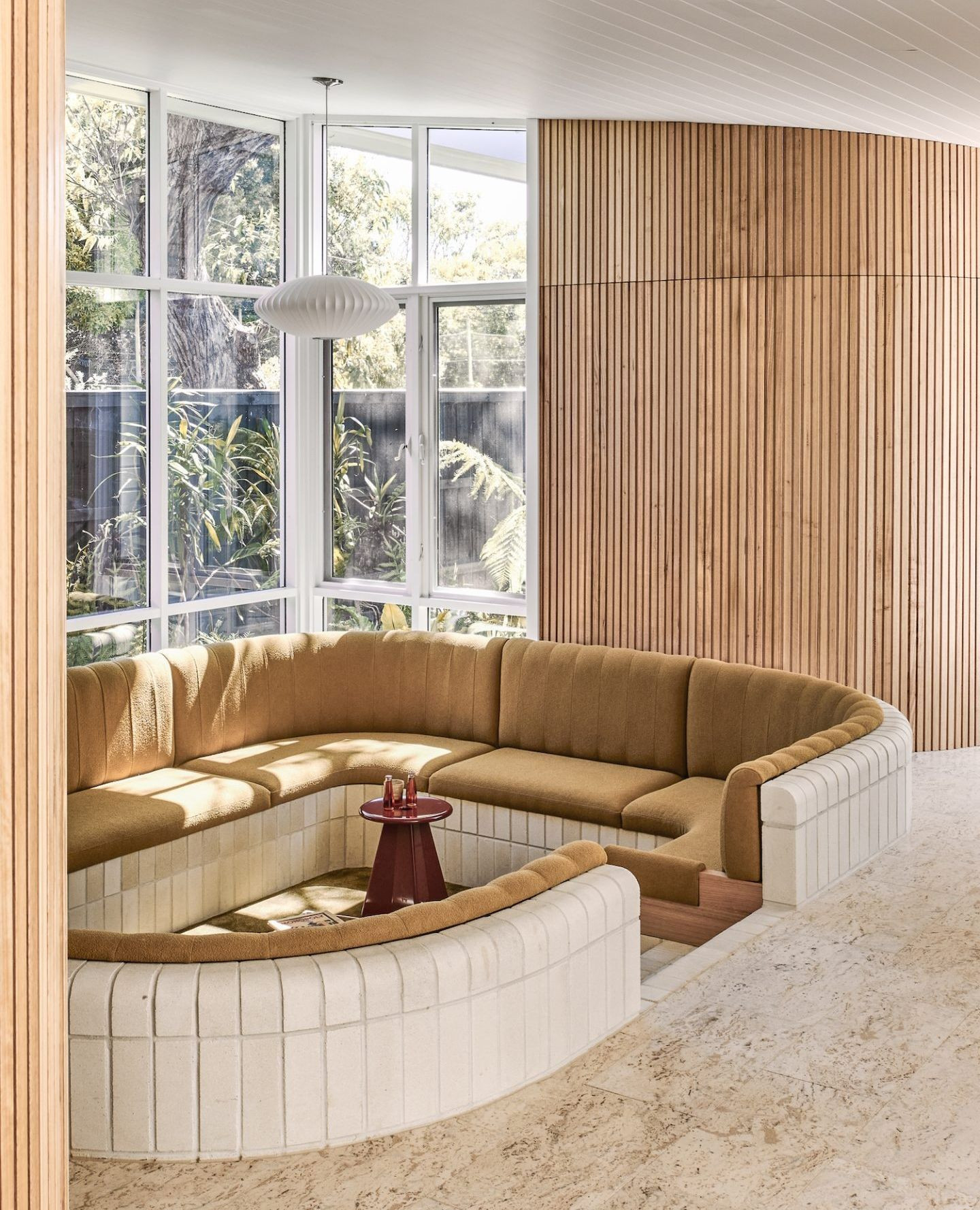 8. Curved Comfort Meets Organic Chic: a Sanctuary Of Softness