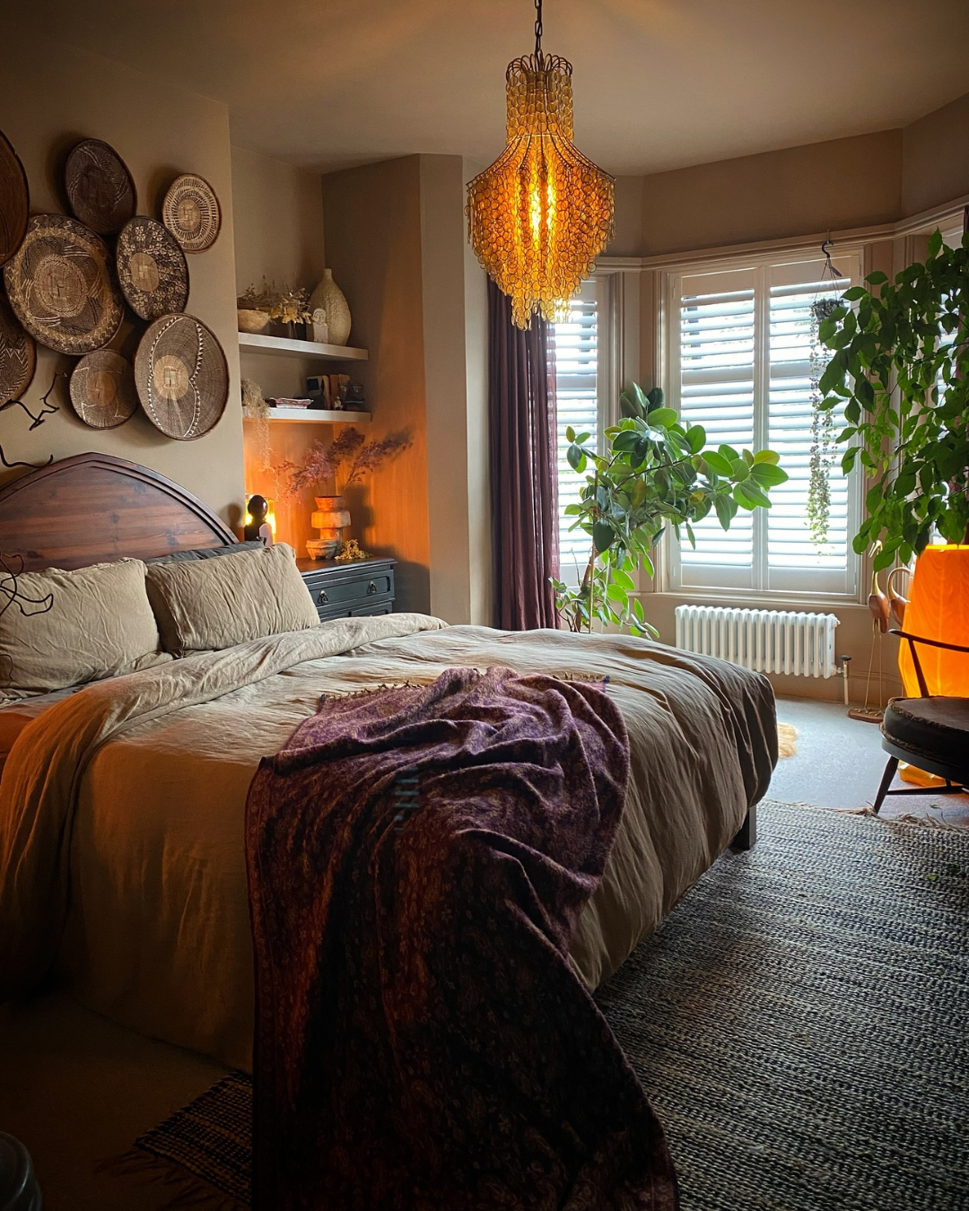 3. the Interwoven Branches Headboard with Mossy Green Accents