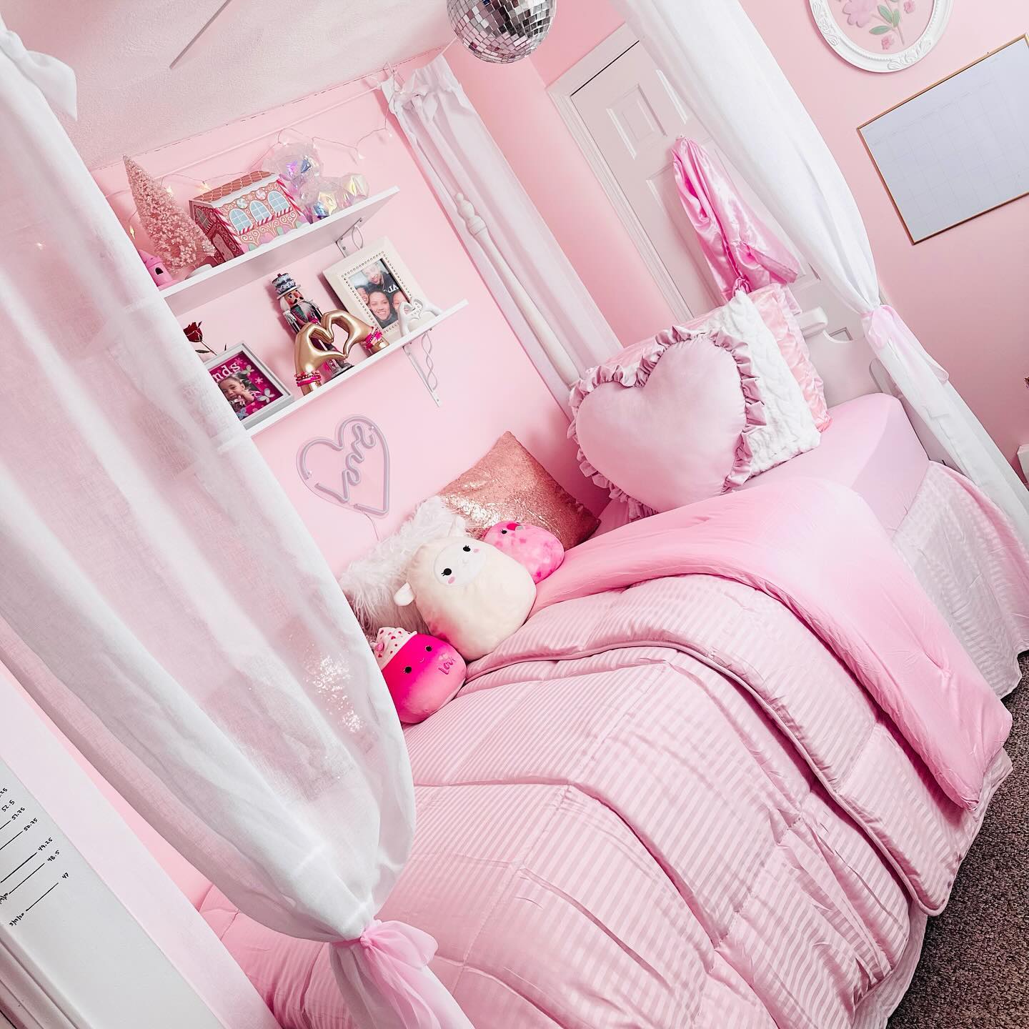 38. Luminous Lace Canopy Over Blush Pink Bed with Gold Accents
