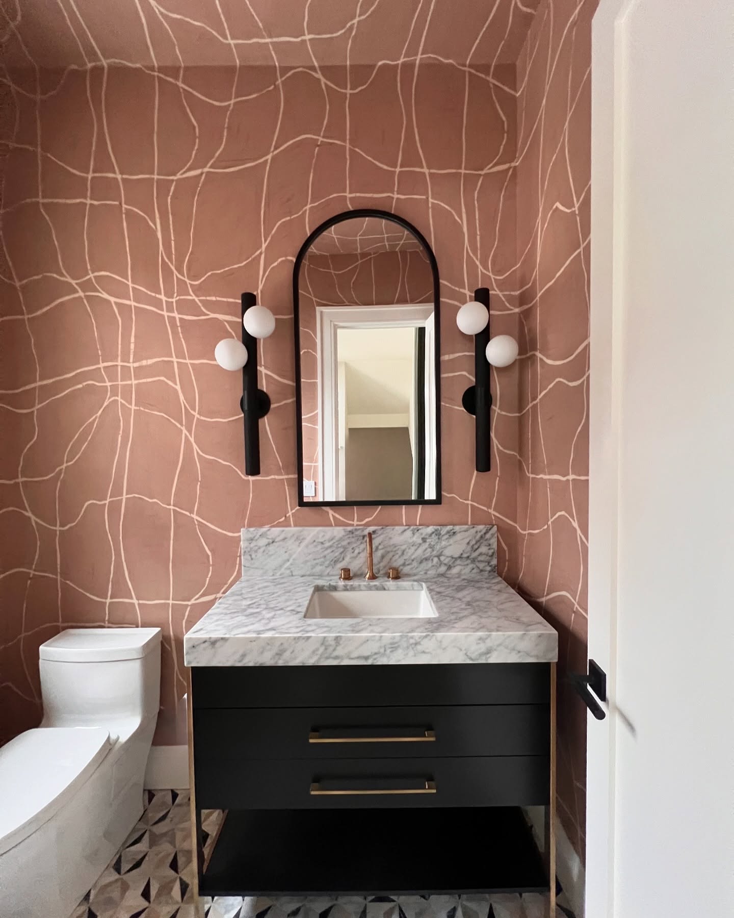 2. Sapphire Waves and Golden Accents: a Bathroom Wallpaper Fantasy