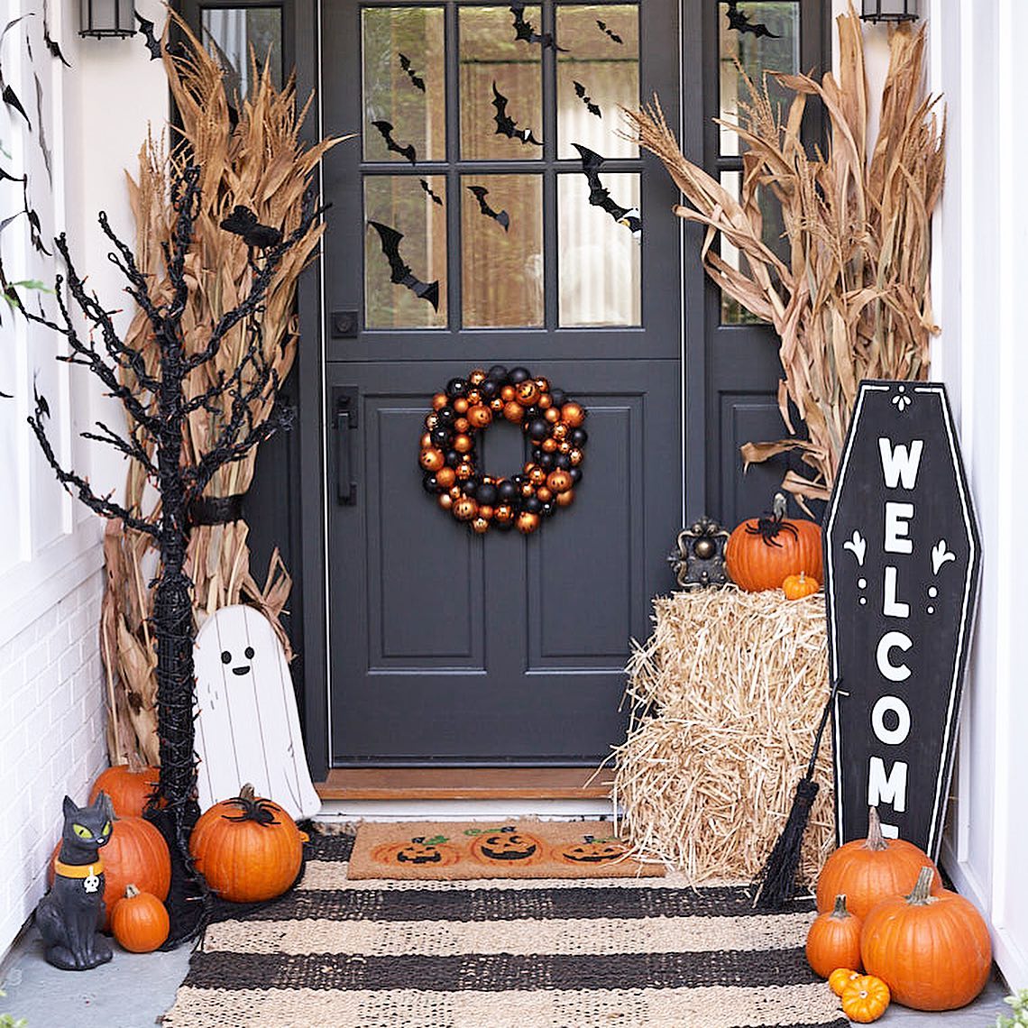 2. a Trio Of Ghoulish Pumpkins with Spiderweb Accents and a Lantern's Glow