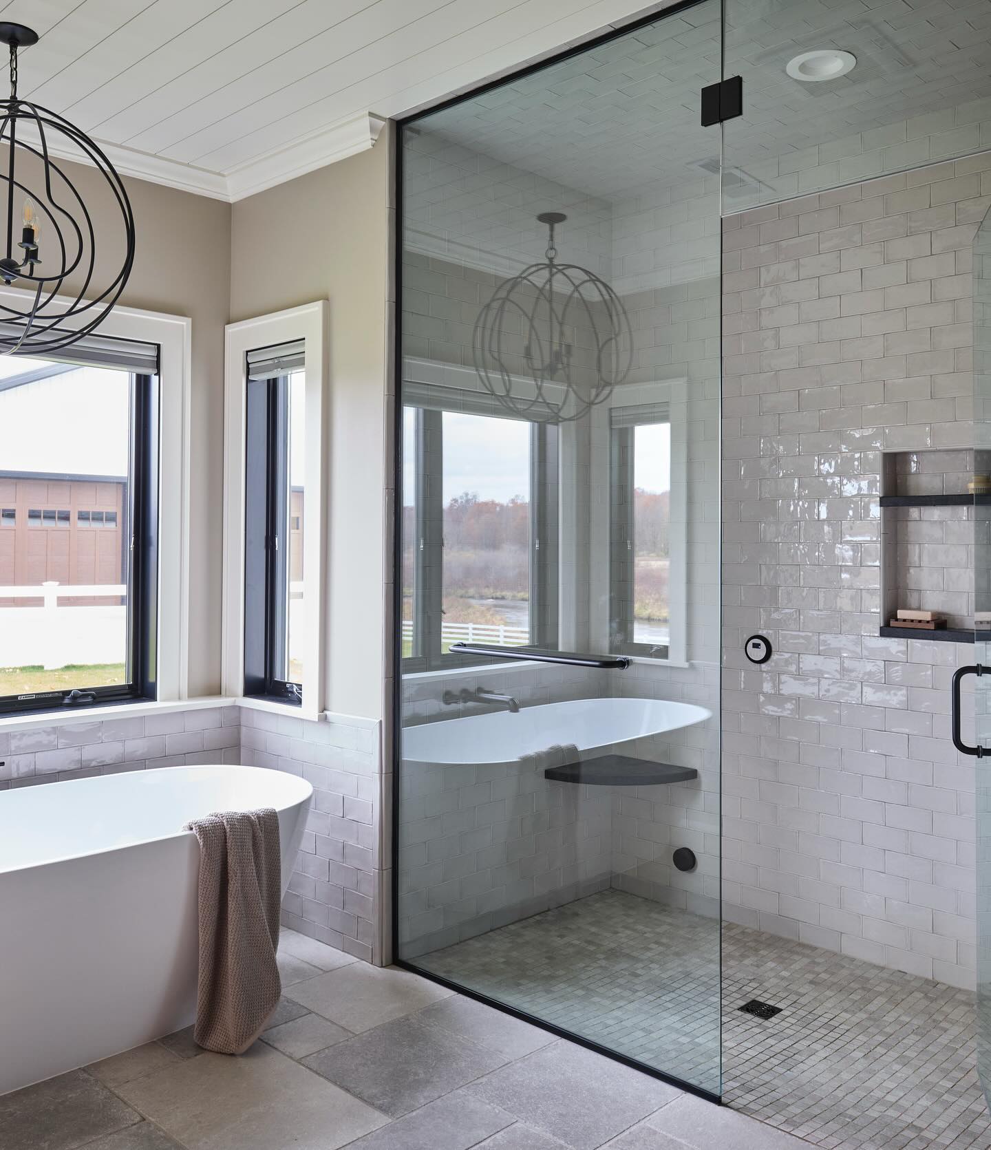 9. Vintage Brass Fixtures Meet Modern Shiplap In a Cozy Retreat